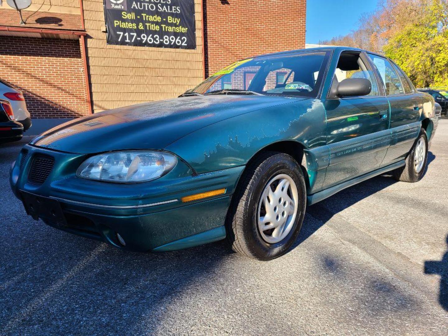 1998 GREEN PONTIAC GRAND AM SE (1G2NE52T4WM) with an 2.4L engine, Automatic transmission, located at 117 North Cameron Street, Harrisburg, PA, 17101, (717) 963-8962, 40.266762, -76.875259 - WE FINANCE!!! Good Credit/ Bad Credit/ No Credit - ALL Trade-Ins Welcomed!!! ***Guaranteed Credit Approval*** APPLY ONLINE or CALL us TODAY ;) Internet Prices and Marketplace Prices are SPECIAL discounted ***CASH DEALS*** Retail Prices are higher. Please call us to discuss your cash and finan - Photo#0