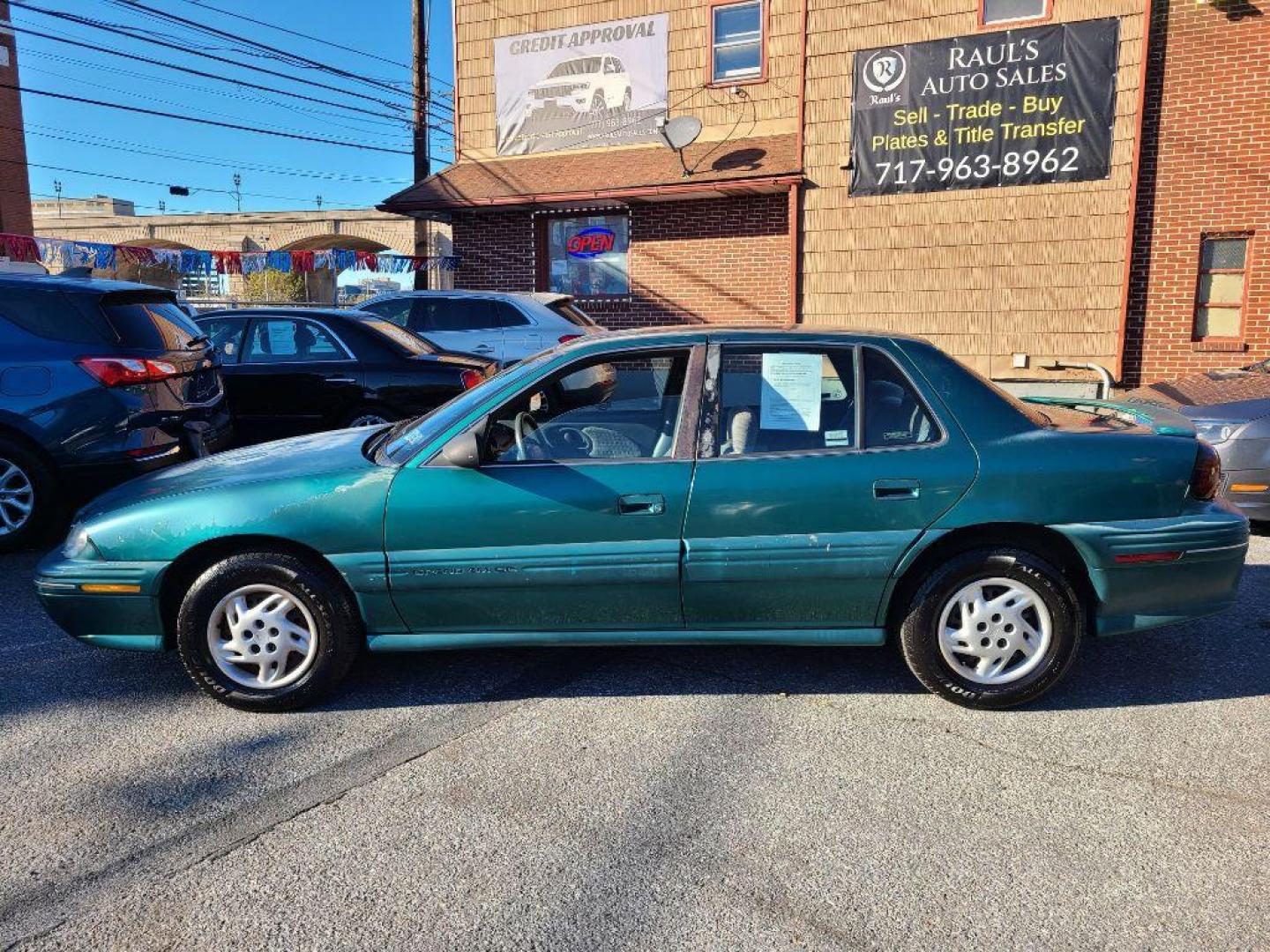 1998 GREEN PONTIAC GRAND AM SE (1G2NE52T4WM) with an 2.4L engine, Automatic transmission, located at 117 North Cameron Street, Harrisburg, PA, 17101, (717) 963-8962, 40.266762, -76.875259 - WE FINANCE!!! Good Credit/ Bad Credit/ No Credit - ALL Trade-Ins Welcomed!!! ***Guaranteed Credit Approval*** APPLY ONLINE or CALL us TODAY ;) Internet Prices and Marketplace Prices are SPECIAL discounted ***CASH DEALS*** Retail Prices are higher. Please call us to discuss your cash and finan - Photo#1