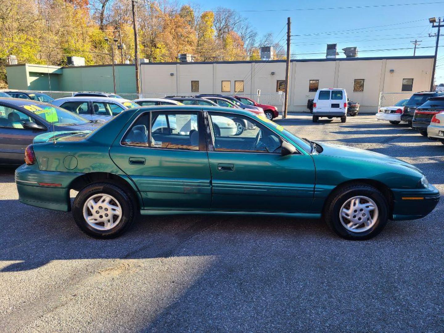 1998 GREEN PONTIAC GRAND AM SE (1G2NE52T4WM) with an 2.4L engine, Automatic transmission, located at 117 North Cameron Street, Harrisburg, PA, 17101, (717) 963-8962, 40.266762, -76.875259 - WE FINANCE!!! Good Credit/ Bad Credit/ No Credit - ALL Trade-Ins Welcomed!!! ***Guaranteed Credit Approval*** APPLY ONLINE or CALL us TODAY ;) Internet Prices and Marketplace Prices are SPECIAL discounted ***CASH DEALS*** Retail Prices are higher. Please call us to discuss your cash and finan - Photo#5