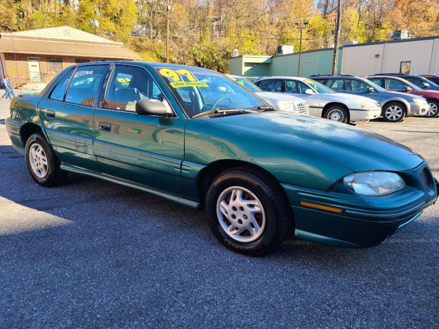 1998 GREEN PONTIAC GRAND AM SE (1G2NE52T4WM) with an 2.4L engine, Automatic transmission, located at 117 North Cameron Street, Harrisburg, PA, 17101, (717) 963-8962, 40.266762, -76.875259 - WE FINANCE!!! Good Credit/ Bad Credit/ No Credit - ALL Trade-Ins Welcomed!!! ***Guaranteed Credit Approval*** APPLY ONLINE or CALL us TODAY ;) Internet Prices and Marketplace Prices are SPECIAL discounted ***CASH DEALS*** Retail Prices are higher. Please call us to discuss your cash and finan - Photo#6