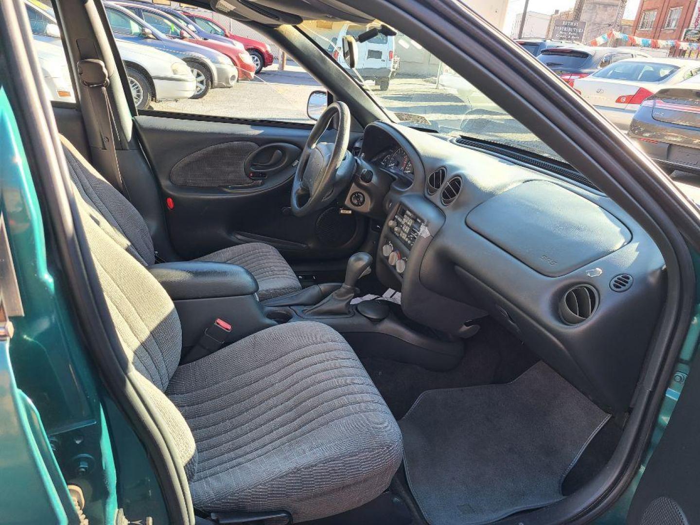 1998 GREEN PONTIAC GRAND AM SE (1G2NE52T4WM) with an 2.4L engine, Automatic transmission, located at 117 North Cameron Street, Harrisburg, PA, 17101, (717) 963-8962, 40.266762, -76.875259 - WE FINANCE!!! Good Credit/ Bad Credit/ No Credit - ALL Trade-Ins Welcomed!!! ***Guaranteed Credit Approval*** APPLY ONLINE or CALL us TODAY ;) Internet Prices and Marketplace Prices are SPECIAL discounted ***CASH DEALS*** Retail Prices are higher. Please call us to discuss your cash and finan - Photo#8