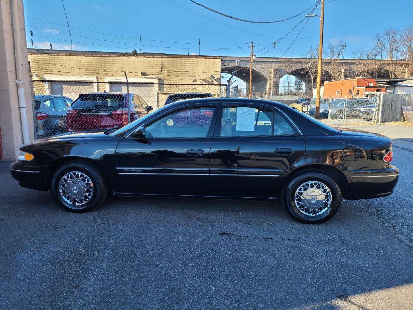 2001 BLACK BUICK CENTURY LIMITED (2G4WY55J211) with an 3.1L engine, Automatic transmission, located at 117 North Cameron Street, Harrisburg, PA, 17101, (717) 963-8962, 40.266762, -76.875259 - WE FINANCE!!! Good Credit/ Bad Credit/ No Credit - ALL Trade-Ins Welcomed!!! ***Guaranteed Credit Approval*** APPLY ONLINE or CALL us TODAY ;) Internet Prices and Marketplace Prices are SPECIAL discounted ***CASH DEALS*** Retail Prices are higher. Please call us to discuss your cash and finan - Photo#1