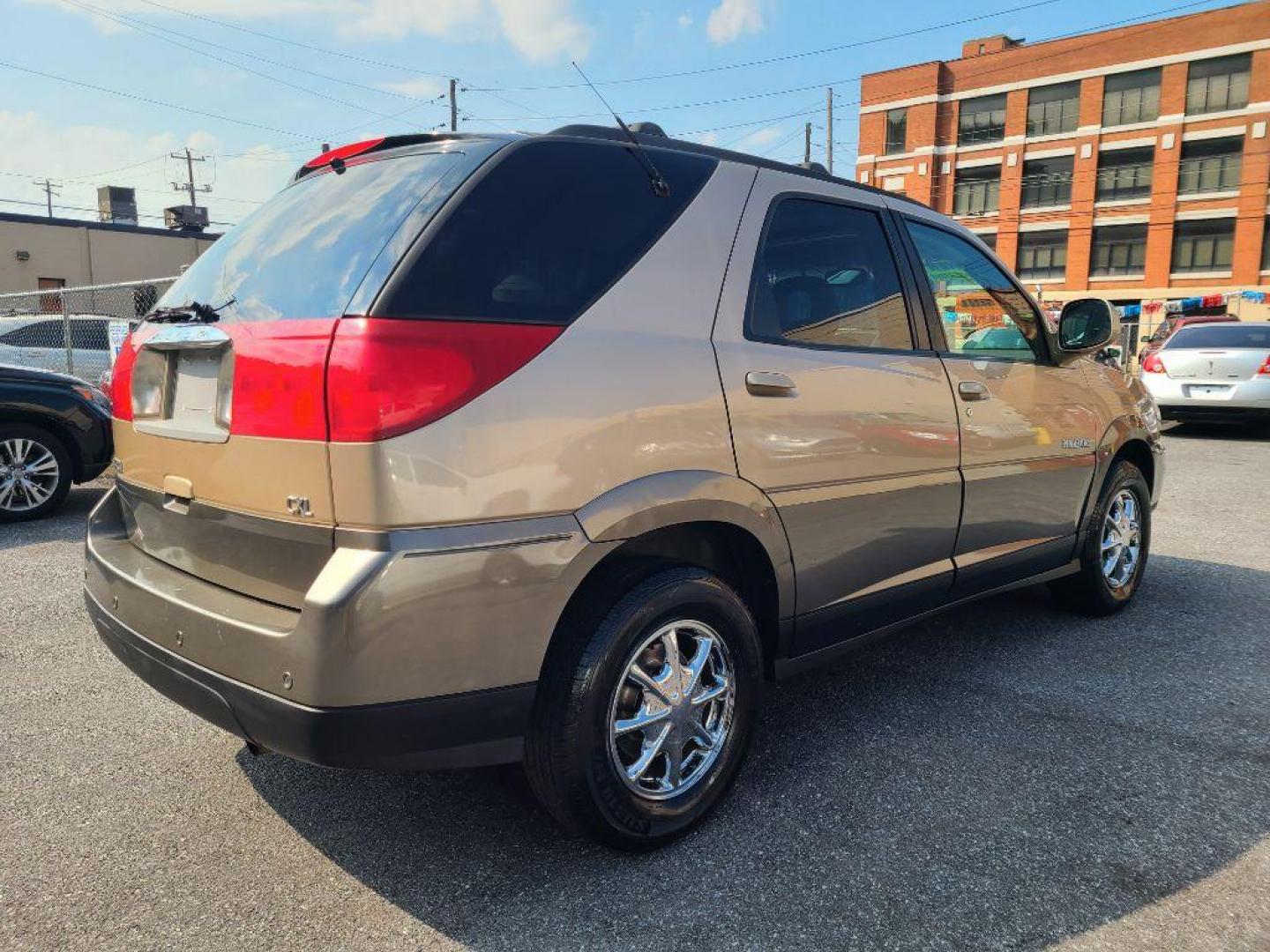 2002 TAN BUICK RENDEZVOUS CX (3G5DB03E32S) with an 3.4L engine, Automatic transmission, located at 117 North Cameron Street, Harrisburg, PA, 17101, (717) 963-8962, 40.266762, -76.875259 - WE FINANCE!!! Good Credit/ Bad Credit/ No Credit - ALL Trade-Ins Welcomed!!! ***Guaranteed Credit Approval*** APPLY ONLINE or CALL us TODAY ;) Internet Prices and Marketplace Prices are SPECIAL discounted ***CASH DEALS*** Retail Prices are higher. Please call us to discuss your cash and finan - Photo#4