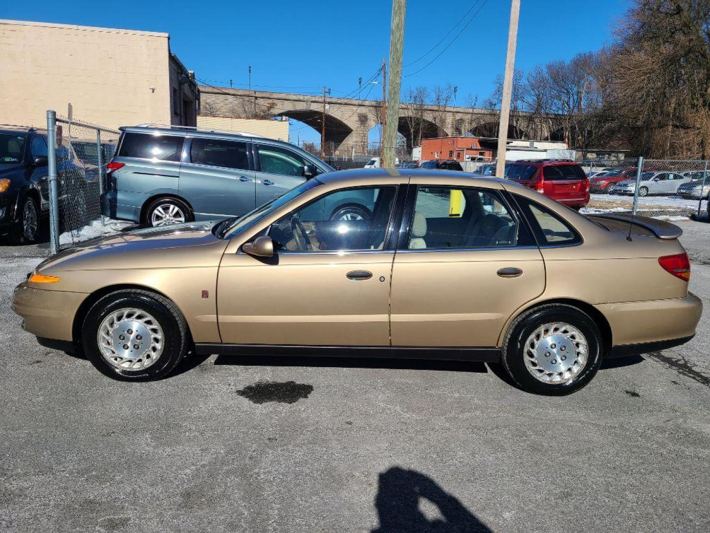 2002 GOLD SATURN L100 SEDAN (1G8JS54F72Y) with an 2.2L engine, Automatic transmission, located at 117 North Cameron Street, Harrisburg, PA, 17101, (717) 963-8962, 40.266762, -76.875259 - WE FINANCE!!! Good Credit/ Bad Credit/ No Credit - ALL Trade-Ins Welcomed!!! ***Guaranteed Credit Approval*** APPLY ONLINE or CALL us TODAY ;) Internet Prices and Marketplace Prices are SPECIAL discounted ***CASH DEALS*** Retail Prices are higher. Please call us to discuss your cash and finan - Photo#1