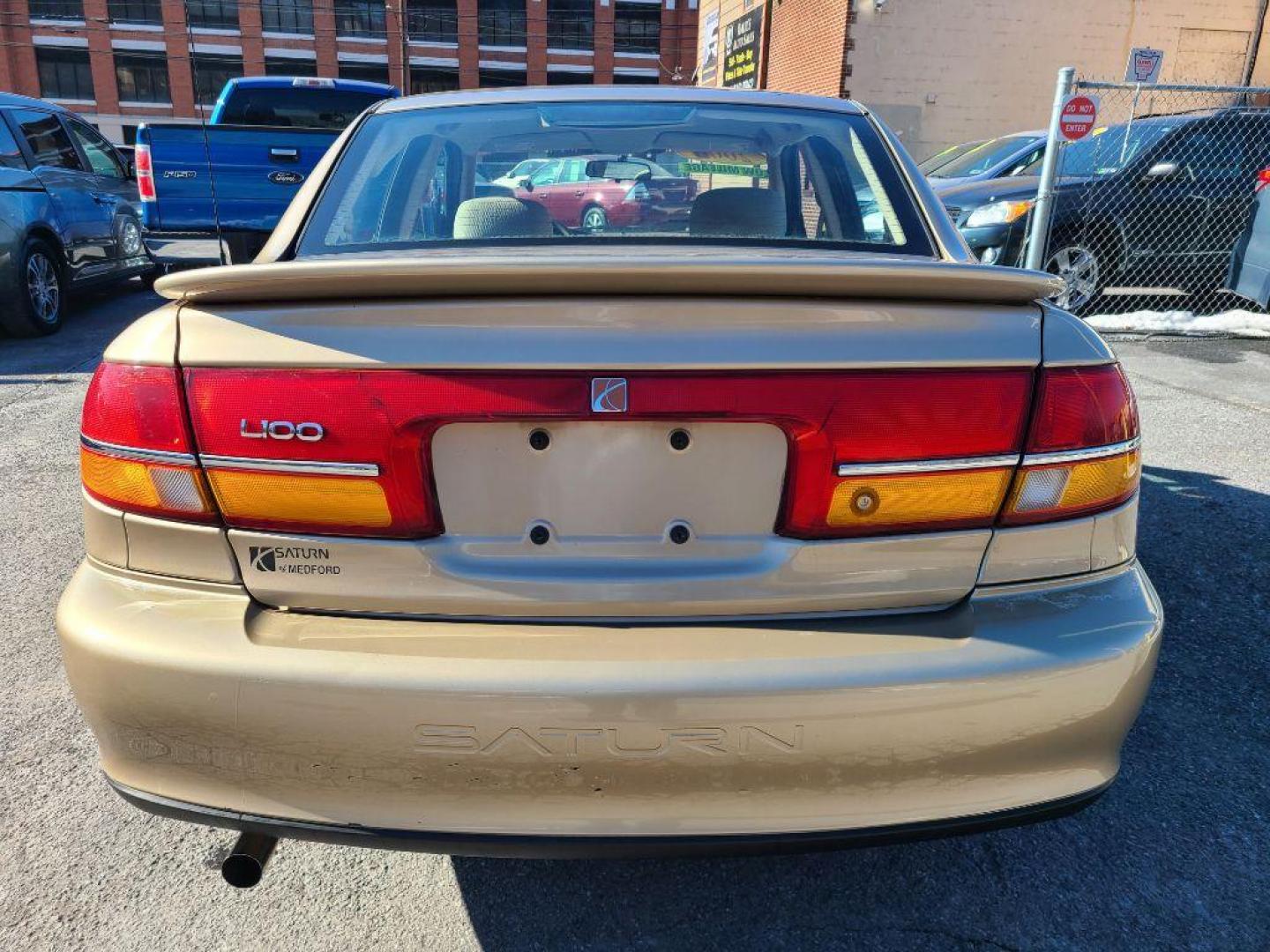 2002 GOLD SATURN L100 SEDAN (1G8JS54F72Y) with an 2.2L engine, Automatic transmission, located at 117 North Cameron Street, Harrisburg, PA, 17101, (717) 963-8962, 40.266762, -76.875259 - WE FINANCE!!! Good Credit/ Bad Credit/ No Credit - ALL Trade-Ins Welcomed!!! ***Guaranteed Credit Approval*** APPLY ONLINE or CALL us TODAY ;) Internet Prices and Marketplace Prices are SPECIAL discounted ***CASH DEALS*** Retail Prices are higher. Please call us to discuss your cash and finan - Photo#3