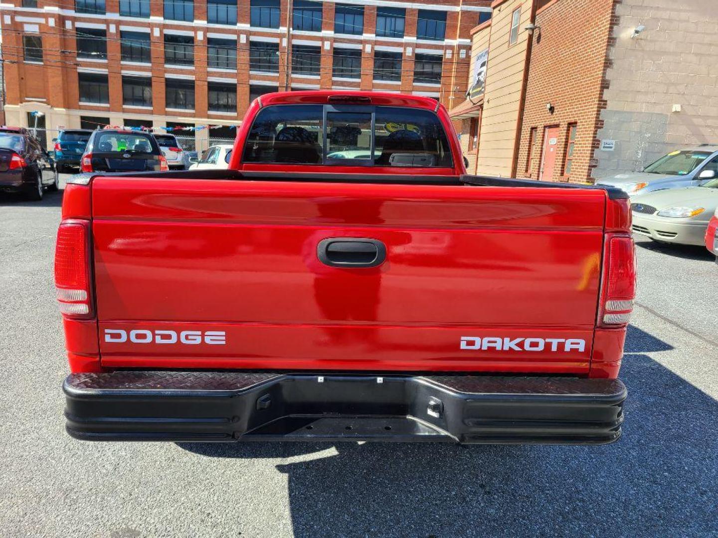 2003 RED DODGE DAKOTA SXT (1D7GG16X23S) with an 3.9L engine, Automatic transmission, located at 117 North Cameron Street, Harrisburg, PA, 17101, (717) 963-8962, 40.266762, -76.875259 - WE FINANCE!!! Good Credit/ Bad Credit/ No Credit - ALL Trade-Ins Welcomed!!! ***Guaranteed Credit Approval*** APPLY ONLINE or CALL us TODAY ;) Internet Prices and Marketplace Prices are SPECIAL discounted ***CASH DEALS*** Retail Prices are higher. Please call us to discuss your cash and finan - Photo#3