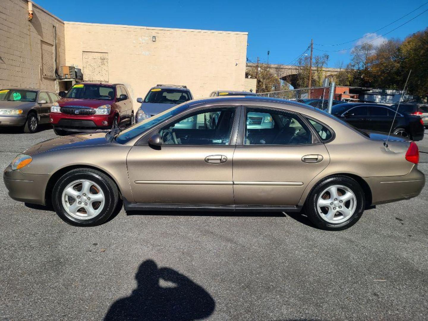 2003 TAN FORD TAURUS SES (1FAHP55U53G) with an 3.0L engine, Automatic transmission, located at 117 North Cameron Street, Harrisburg, PA, 17101, (717) 963-8962, 40.266762, -76.875259 - WE FINANCE!!! Good Credit/ Bad Credit/ No Credit - ALL Trade-Ins Welcomed!!! ***Guaranteed Credit Approval*** APPLY ONLINE or CALL us TODAY ;) Internet Prices and Marketplace Prices are SPECIAL discounted ***CASH DEALS*** Retail Prices are higher. Please call us to discuss your cash and finan - Photo#1