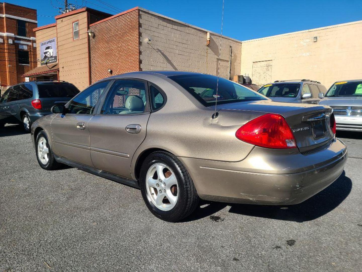 2003 TAN FORD TAURUS SES (1FAHP55U53G) with an 3.0L engine, Automatic transmission, located at 117 North Cameron Street, Harrisburg, PA, 17101, (717) 963-8962, 40.266762, -76.875259 - WE FINANCE!!! Good Credit/ Bad Credit/ No Credit - ALL Trade-Ins Welcomed!!! ***Guaranteed Credit Approval*** APPLY ONLINE or CALL us TODAY ;) Internet Prices and Marketplace Prices are SPECIAL discounted ***CASH DEALS*** Retail Prices are higher. Please call us to discuss your cash and finan - Photo#2