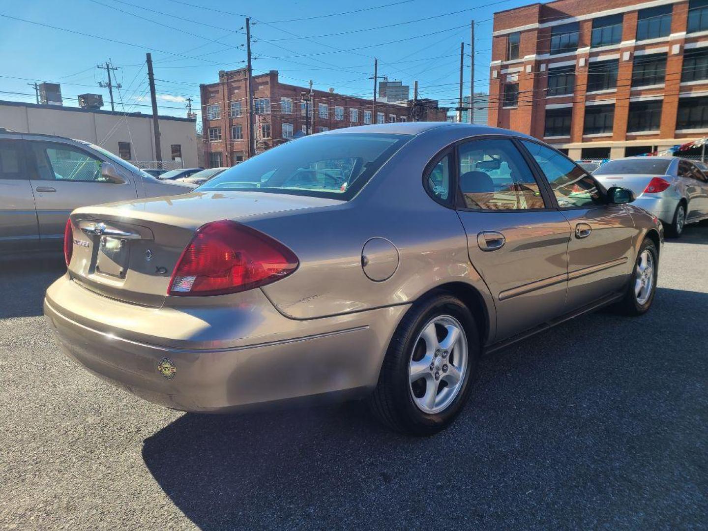 2003 TAN FORD TAURUS SES (1FAHP55U53G) with an 3.0L engine, Automatic transmission, located at 117 North Cameron Street, Harrisburg, PA, 17101, (717) 963-8962, 40.266762, -76.875259 - WE FINANCE!!! Good Credit/ Bad Credit/ No Credit - ALL Trade-Ins Welcomed!!! ***Guaranteed Credit Approval*** APPLY ONLINE or CALL us TODAY ;) Internet Prices and Marketplace Prices are SPECIAL discounted ***CASH DEALS*** Retail Prices are higher. Please call us to discuss your cash and finan - Photo#4