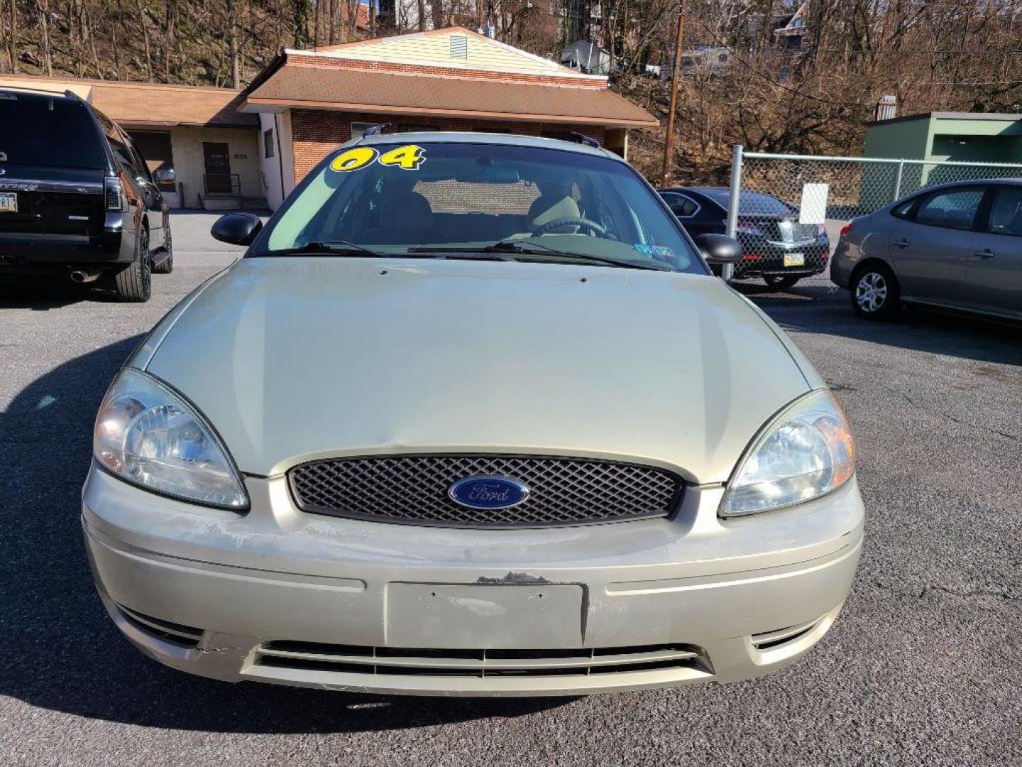 2004 TAN FORD TAURUS SE (1FAFP58284A) with an 3.0L engine, Automatic transmission, located at 117 North Cameron Street, Harrisburg, PA, 17101, (717) 963-8962, 40.266762, -76.875259 - WE FINANCE!!! Good Credit/ Bad Credit/ No Credit - ALL Trade-Ins Welcomed!!! ***Guaranteed Credit Approval*** APPLY ONLINE or CALL us TODAY ;) Internet Prices and Marketplace Prices are SPECIAL discounted ***CASH DEALS*** Retail Prices are higher. Please call us to discuss your cash and finan - Photo#7