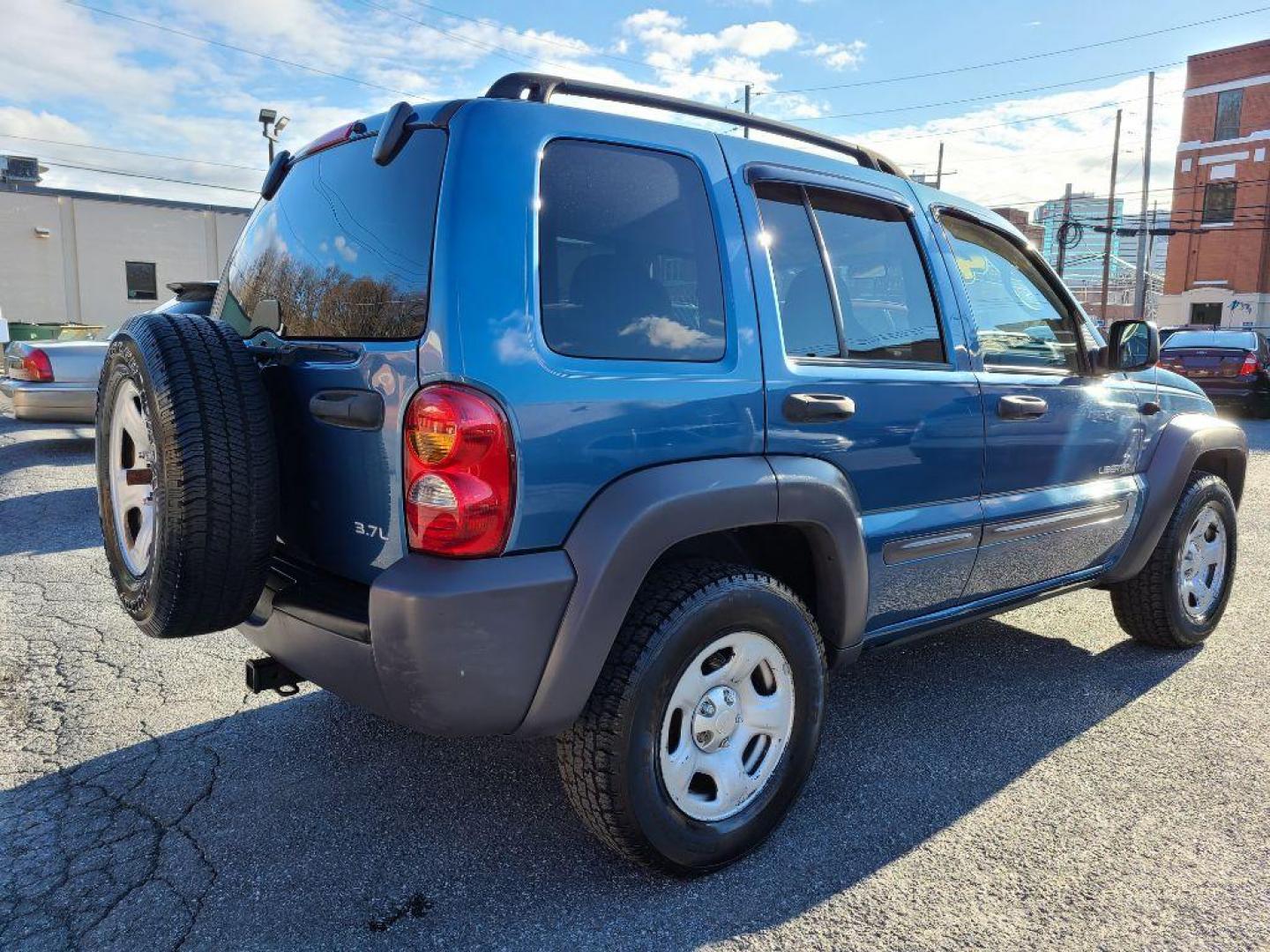 2004 BLUE JEEP LIBERTY SPORT (1J4GK48K14W) with an 3.7L engine, Automatic transmission, located at 117 North Cameron Street, Harrisburg, PA, 17101, (717) 963-8962, 40.266762, -76.875259 - WE FINANCE!!! Good Credit/ Bad Credit/ No Credit - ALL Trade-Ins Welcomed!!! ***Guaranteed Credit Approval*** APPLY ONLINE or CALL us TODAY ;) Internet Prices and Marketplace Prices are SPECIAL discounted ***CASH DEALS*** Retail Prices are higher. Please call us to discuss your cash and finan - Photo#4