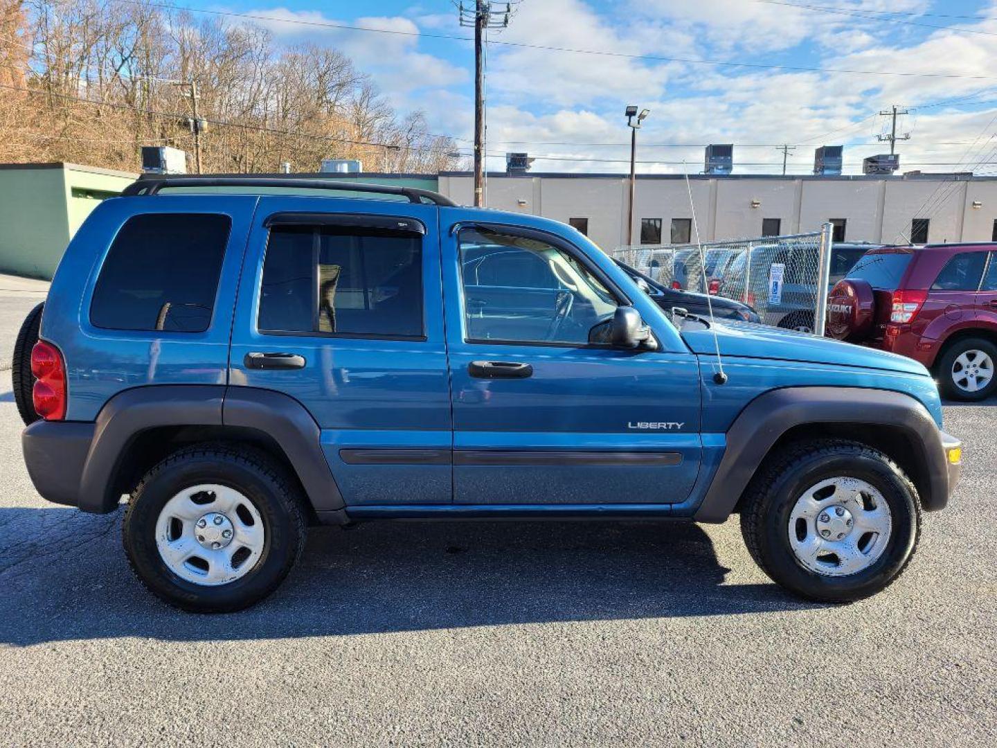 2004 BLUE JEEP LIBERTY SPORT (1J4GK48K14W) with an 3.7L engine, Automatic transmission, located at 117 North Cameron Street, Harrisburg, PA, 17101, (717) 963-8962, 40.266762, -76.875259 - WE FINANCE!!! Good Credit/ Bad Credit/ No Credit - ALL Trade-Ins Welcomed!!! ***Guaranteed Credit Approval*** APPLY ONLINE or CALL us TODAY ;) Internet Prices and Marketplace Prices are SPECIAL discounted ***CASH DEALS*** Retail Prices are higher. Please call us to discuss your cash and finan - Photo#5