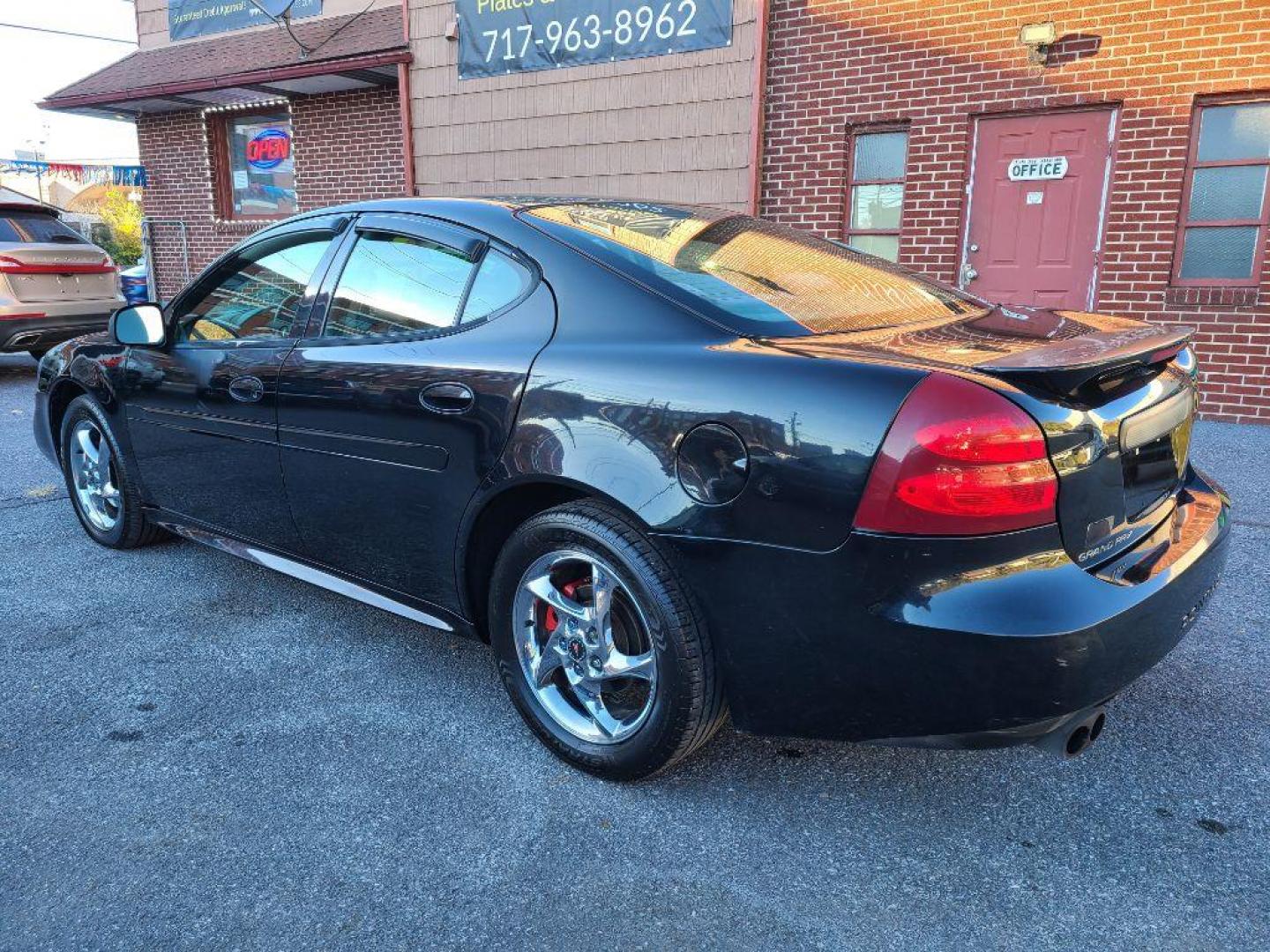 2004 BLACK PONTIAC GRAND PRIX GTP (2G2WR524741) with an 3.8L engine, Automatic transmission, located at 117 North Cameron Street, Harrisburg, PA, 17101, (717) 963-8962, 40.266762, -76.875259 - WE FINANCE!!! Good Credit/ Bad Credit/ No Credit - ALL Trade-Ins Welcomed!!! ***Guaranteed Credit Approval*** APPLY ONLINE or CALL us TODAY ;) Internet Prices and Marketplace Prices are SPECIAL discounted ***CASH DEALS*** Retail Prices are higher. Please call us to discuss your cash and finan - Photo#2