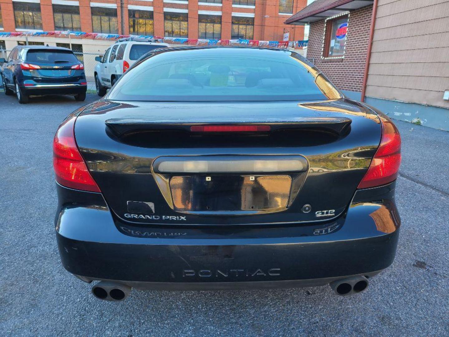 2004 BLACK PONTIAC GRAND PRIX GTP (2G2WR524741) with an 3.8L engine, Automatic transmission, located at 117 North Cameron Street, Harrisburg, PA, 17101, (717) 963-8962, 40.266762, -76.875259 - WE FINANCE!!! Good Credit/ Bad Credit/ No Credit - ALL Trade-Ins Welcomed!!! ***Guaranteed Credit Approval*** APPLY ONLINE or CALL us TODAY ;) Internet Prices and Marketplace Prices are SPECIAL discounted ***CASH DEALS*** Retail Prices are higher. Please call us to discuss your cash and finan - Photo#3