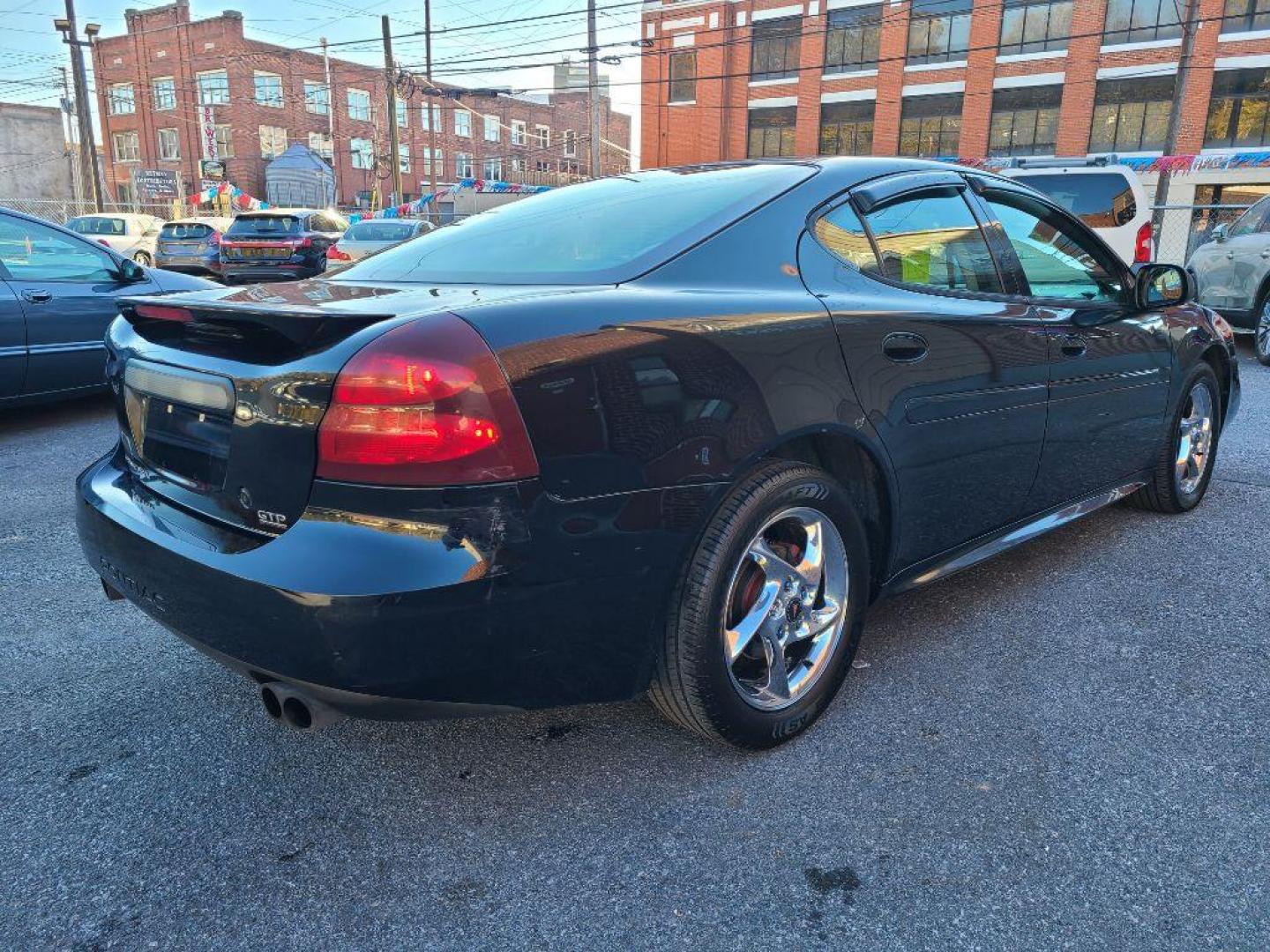 2004 BLACK PONTIAC GRAND PRIX GTP (2G2WR524741) with an 3.8L engine, Automatic transmission, located at 117 North Cameron Street, Harrisburg, PA, 17101, (717) 963-8962, 40.266762, -76.875259 - WE FINANCE!!! Good Credit/ Bad Credit/ No Credit - ALL Trade-Ins Welcomed!!! ***Guaranteed Credit Approval*** APPLY ONLINE or CALL us TODAY ;) Internet Prices and Marketplace Prices are SPECIAL discounted ***CASH DEALS*** Retail Prices are higher. Please call us to discuss your cash and finan - Photo#4