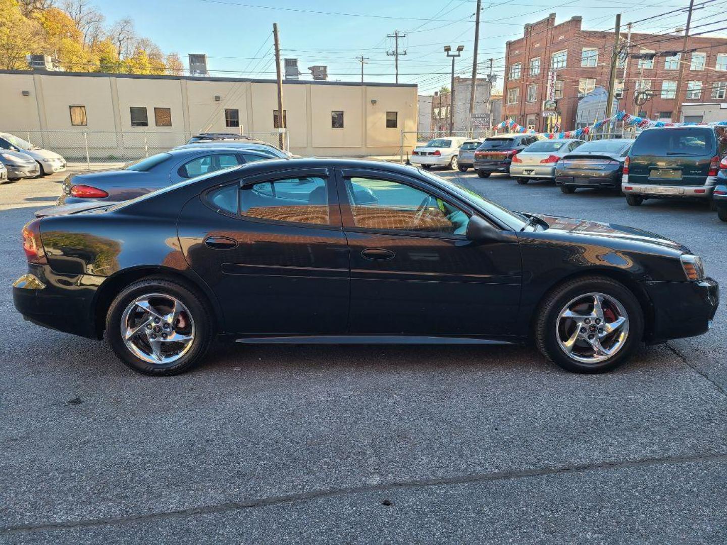 2004 BLACK PONTIAC GRAND PRIX GTP (2G2WR524741) with an 3.8L engine, Automatic transmission, located at 117 North Cameron Street, Harrisburg, PA, 17101, (717) 963-8962, 40.266762, -76.875259 - WE FINANCE!!! Good Credit/ Bad Credit/ No Credit - ALL Trade-Ins Welcomed!!! ***Guaranteed Credit Approval*** APPLY ONLINE or CALL us TODAY ;) Internet Prices and Marketplace Prices are SPECIAL discounted ***CASH DEALS*** Retail Prices are higher. Please call us to discuss your cash and finan - Photo#5