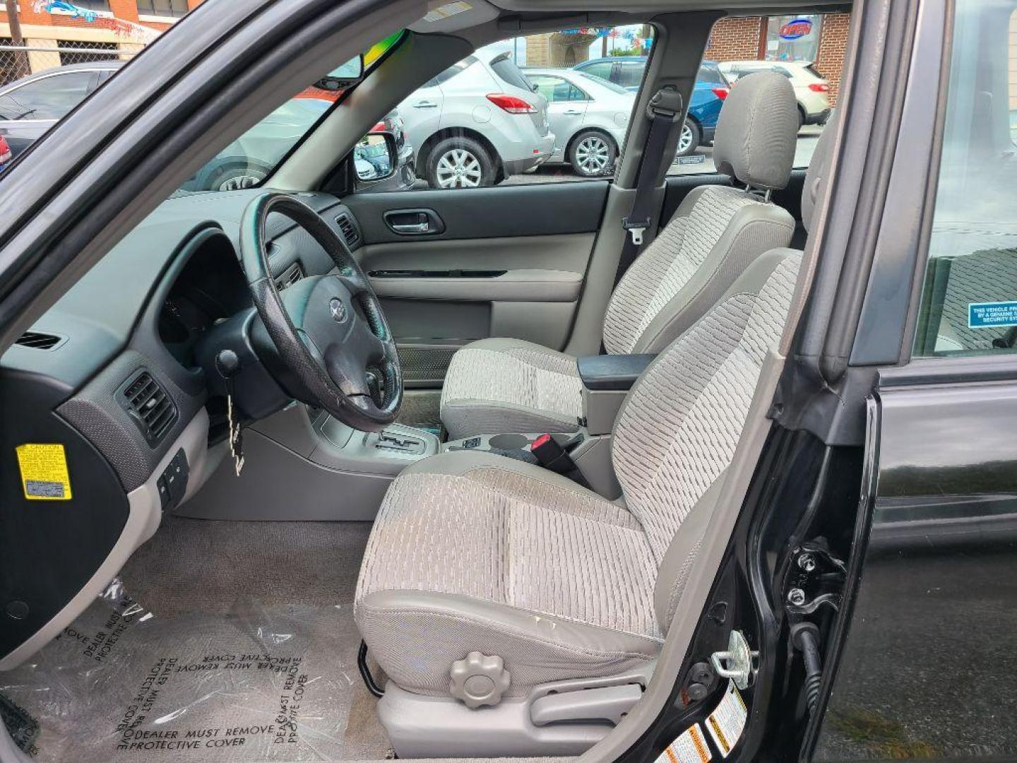 2004 BLACK SUBARU FORESTER 2.5XS (JF1SG65664H) with an 2.5L engine, Automatic transmission, located at 117 North Cameron Street, Harrisburg, PA, 17101, (717) 963-8962, 40.266762, -76.875259 - WE FINANCE!!! Good Credit/ Bad Credit/ No Credit - ALL Trade-Ins Welcomed!!! ***Guaranteed Credit Approval*** APPLY ONLINE or CALL us TODAY ;) Internet Prices and Marketplace Prices are SPECIAL discounted ***CASH DEALS*** Retail Prices are higher. Please call us to discuss your cash and finan - Photo#14