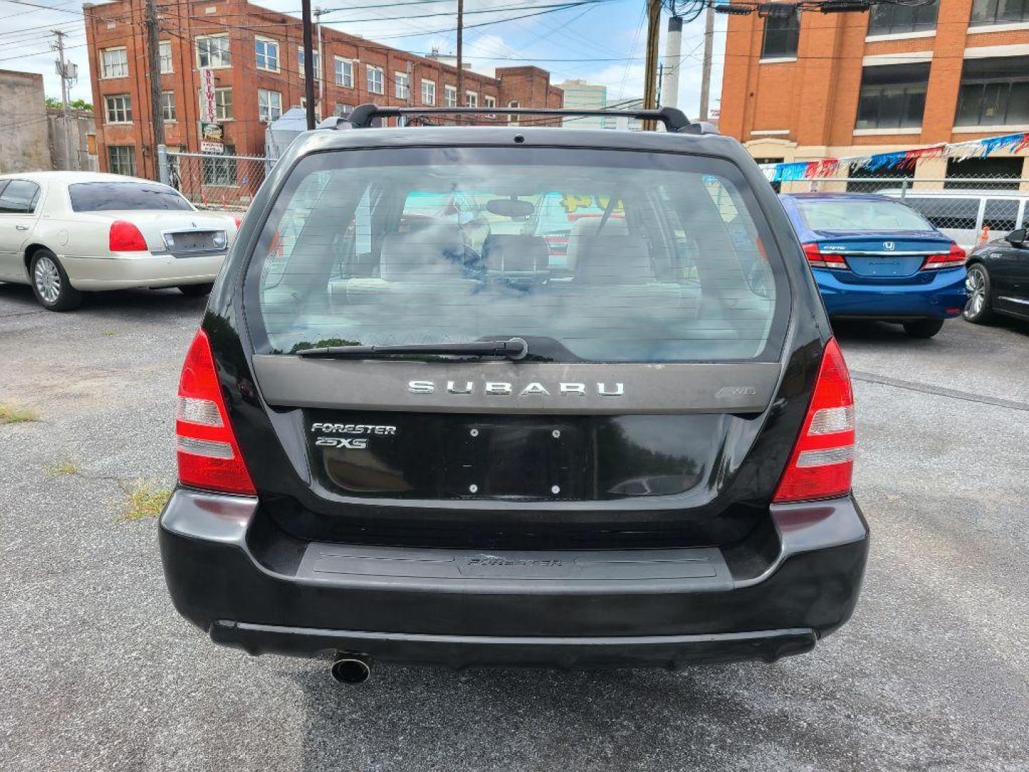 2004 BLACK SUBARU FORESTER 2.5XS (JF1SG65664H) with an 2.5L engine, Automatic transmission, located at 117 North Cameron Street, Harrisburg, PA, 17101, (717) 963-8962, 40.266762, -76.875259 - WE FINANCE!!! Good Credit/ Bad Credit/ No Credit - ALL Trade-Ins Welcomed!!! ***Guaranteed Credit Approval*** APPLY ONLINE or CALL us TODAY ;) Internet Prices and Marketplace Prices are SPECIAL discounted ***CASH DEALS*** Retail Prices are higher. Please call us to discuss your cash and finan - Photo#3