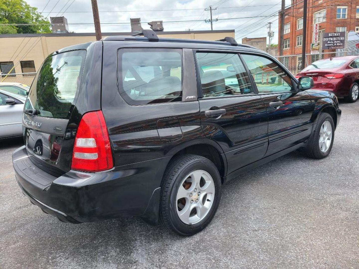 2004 BLACK SUBARU FORESTER 2.5XS (JF1SG65664H) with an 2.5L engine, Automatic transmission, located at 117 North Cameron Street, Harrisburg, PA, 17101, (717) 963-8962, 40.266762, -76.875259 - WE FINANCE!!! Good Credit/ Bad Credit/ No Credit - ALL Trade-Ins Welcomed!!! ***Guaranteed Credit Approval*** APPLY ONLINE or CALL us TODAY ;) Internet Prices and Marketplace Prices are SPECIAL discounted ***CASH DEALS*** Retail Prices are higher. Please call us to discuss your cash and finan - Photo#4