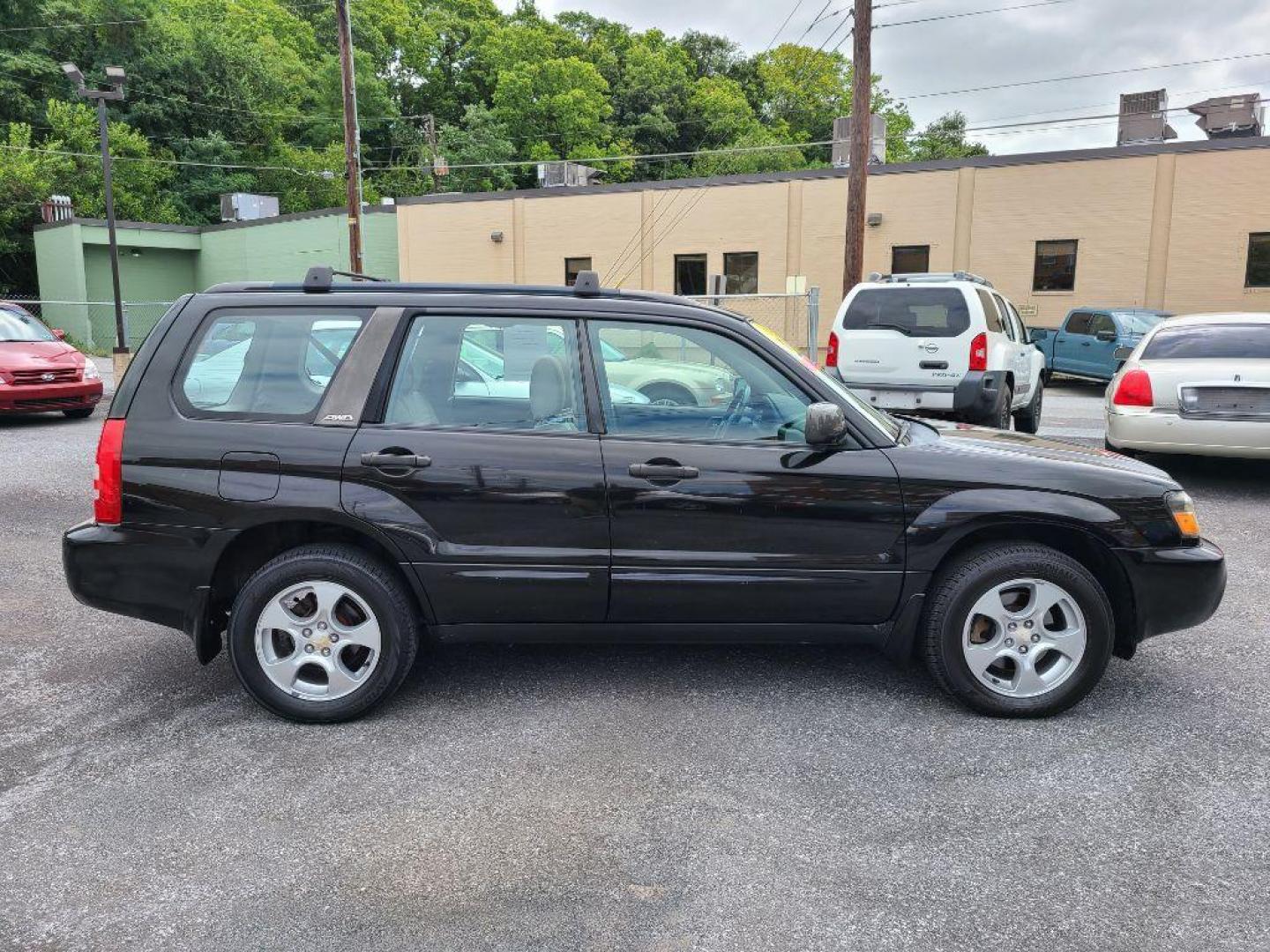 2004 BLACK SUBARU FORESTER 2.5XS (JF1SG65664H) with an 2.5L engine, Automatic transmission, located at 117 North Cameron Street, Harrisburg, PA, 17101, (717) 963-8962, 40.266762, -76.875259 - WE FINANCE!!! Good Credit/ Bad Credit/ No Credit - ALL Trade-Ins Welcomed!!! ***Guaranteed Credit Approval*** APPLY ONLINE or CALL us TODAY ;) Internet Prices and Marketplace Prices are SPECIAL discounted ***CASH DEALS*** Retail Prices are higher. Please call us to discuss your cash and finan - Photo#5