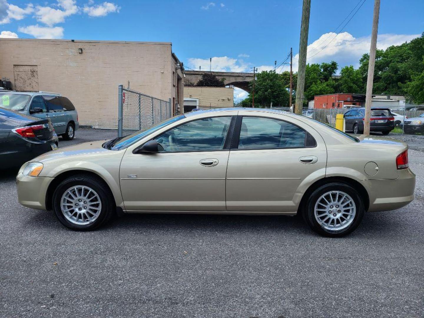 2005 GOLD CHRYSLER SEBRING TOURING (1C3EL56R55N) with an 2.7L engine, Automatic transmission, located at 117 North Cameron Street, Harrisburg, PA, 17101, (717) 963-8962, 40.266762, -76.875259 - WE FINANCE!!! Good Credit/ Bad Credit/ No Credit - ALL Trade-Ins Welcomed!!! ***Guaranteed Credit Approval*** APPLY ONLINE or CALL us TODAY ;) Internet Prices and Marketplace Prices are SPECIAL discounted ***CASH DEALS*** Retail Prices are higher. Please call us to discuss your cash and finan - Photo#1