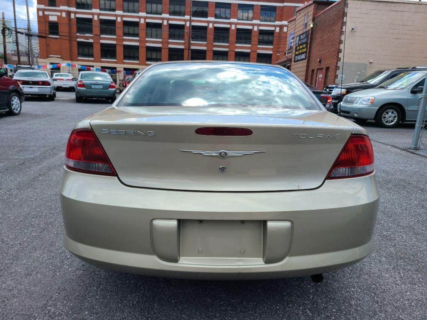 2005 GOLD CHRYSLER SEBRING TOURING (1C3EL56R55N) with an 2.7L engine, Automatic transmission, located at 117 North Cameron Street, Harrisburg, PA, 17101, (717) 963-8962, 40.266762, -76.875259 - WE FINANCE!!! Good Credit/ Bad Credit/ No Credit - ALL Trade-Ins Welcomed!!! ***Guaranteed Credit Approval*** APPLY ONLINE or CALL us TODAY ;) Internet Prices and Marketplace Prices are SPECIAL discounted ***CASH DEALS*** Retail Prices are higher. Please call us to discuss your cash and finan - Photo#3