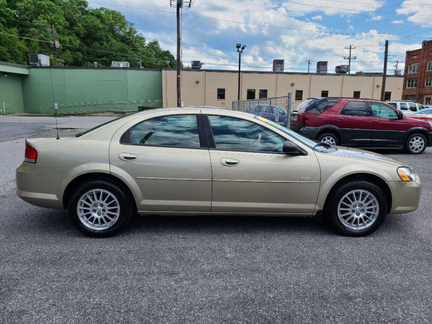 2005 GOLD CHRYSLER SEBRING TOURING (1C3EL56R55N) with an 2.7L engine, Automatic transmission, located at 117 North Cameron Street, Harrisburg, PA, 17101, (717) 963-8962, 40.266762, -76.875259 - WE FINANCE!!! Good Credit/ Bad Credit/ No Credit - ALL Trade-Ins Welcomed!!! ***Guaranteed Credit Approval*** APPLY ONLINE or CALL us TODAY ;) Internet Prices and Marketplace Prices are SPECIAL discounted ***CASH DEALS*** Retail Prices are higher. Please call us to discuss your cash and finan - Photo#5