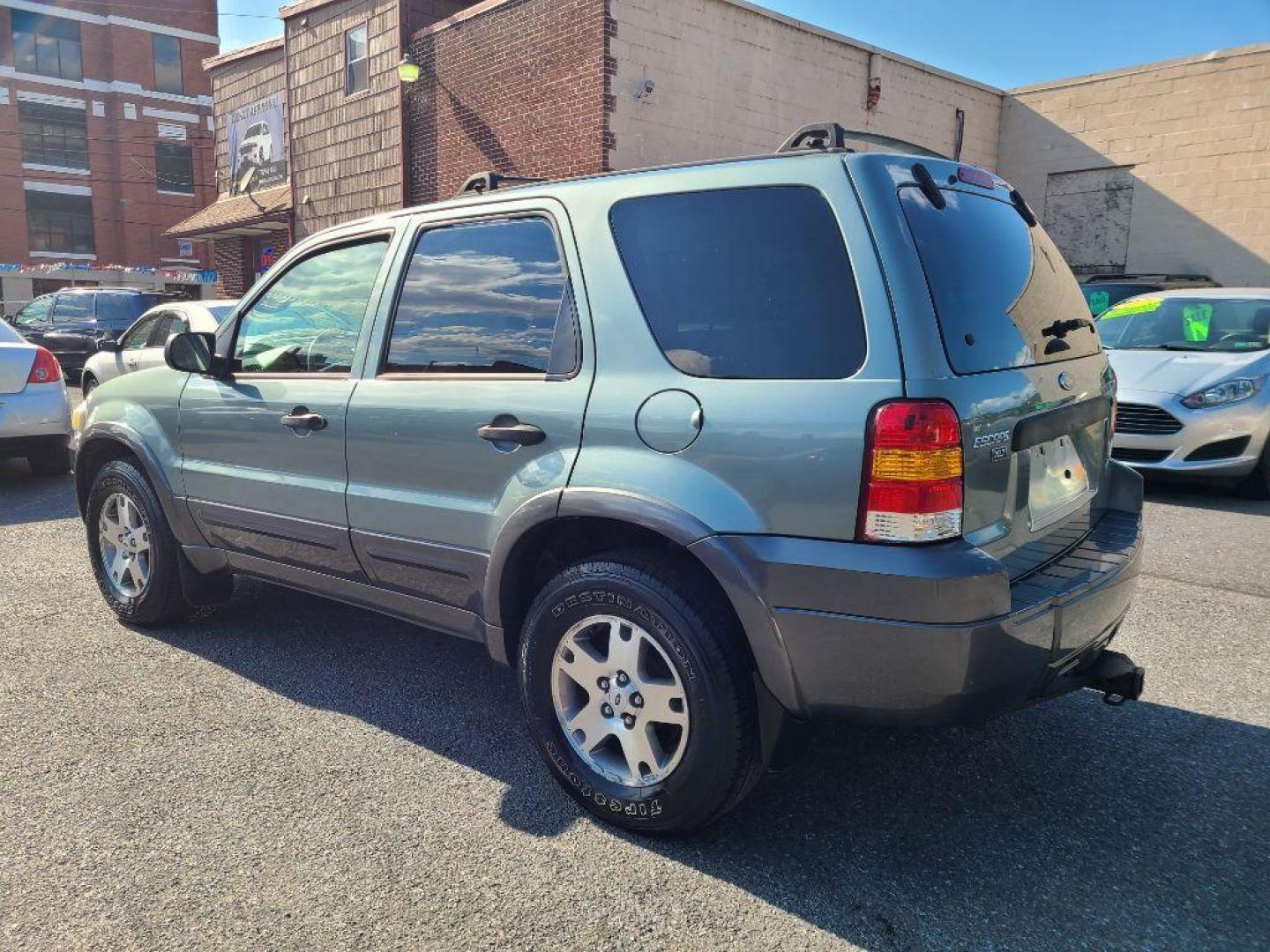 2005 GREEN FORD ESCAPE XLT (1FMCU931X5K) with an 3.0L engine, Automatic transmission, located at 117 North Cameron Street, Harrisburg, PA, 17101, (717) 963-8962, 40.266762, -76.875259 - WE FINANCE!!! Good Credit/ Bad Credit/ No Credit - ALL Trade-Ins Welcomed!!! ***Guaranteed Credit Approval*** APPLY ONLINE or CALL us TODAY ;) Internet Prices and Marketplace Prices are SPECIAL discounted ***CASH DEALS*** Retail Prices are higher. Please call us to discuss your cash and finan - Photo#2