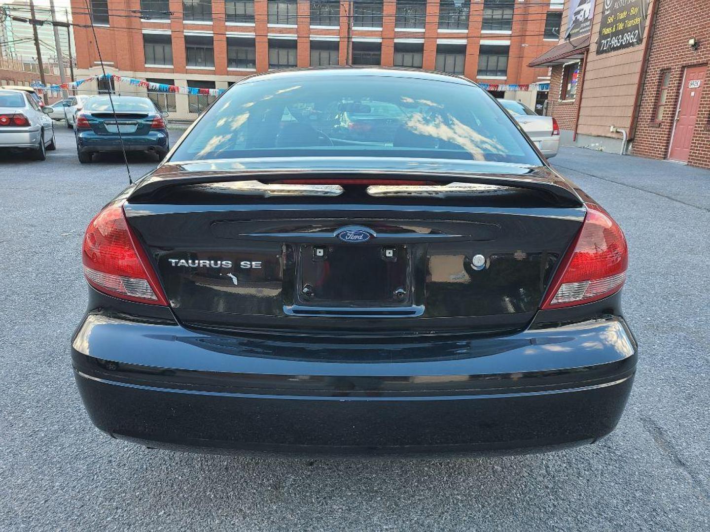 2005 BLACK FORD TAURUS SE (1FAHP53255A) with an 3.0L engine, Automatic transmission, located at 117 North Cameron Street, Harrisburg, PA, 17101, (717) 963-8962, 40.266762, -76.875259 - WE FINANCE!!! Good Credit/ Bad Credit/ No Credit - ALL Trade-Ins Welcomed!!! ***Guaranteed Credit Approval*** APPLY ONLINE or CALL us TODAY ;) Internet Prices and Marketplace Prices are SPECIAL discounted ***CASH DEALS*** Retail Prices are higher. Please call us to discuss your cash and finan - Photo#3