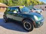 2006 GREEN MINI COOPER HATCHBACK (WMWRC33576T) with an 1.6L engine, Continuously Variable transmission, located at 117 North Cameron Street, Harrisburg, PA, 17101, (717) 963-8962, 40.266762, -76.875259 - WE FINANCE!!! Good Credit/ Bad Credit/ No Credit - ALL Trade-Ins Welcomed!!! ***Guaranteed Credit Approval*** APPLY ONLINE or CALL us TODAY ;) Internet Prices and Marketplace Prices are SPECIAL discounted ***CASH DEALS*** Retail Prices are higher. Please call us to discuss your cash and finan - Photo#6