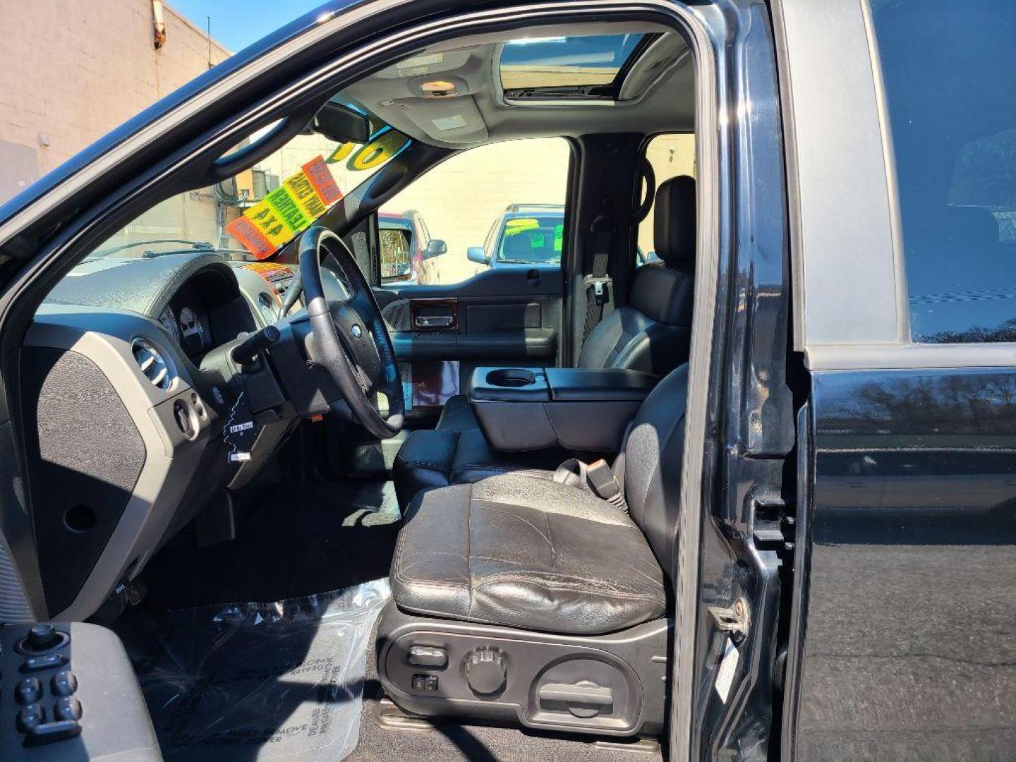 2007 BLACK FORD F150 LARIAT SUPERCREW (1FTPW14V97F) with an 5.4L engine, Automatic transmission, located at 117 North Cameron Street, Harrisburg, PA, 17101, (717) 963-8962, 40.266762, -76.875259 - WE FINANCE!!! Good Credit/ Bad Credit/ No Credit - ALL Trade-Ins Welcomed!!! ***Guaranteed Credit Approval*** APPLY ONLINE or CALL us TODAY ;) Internet Prices and Marketplace Prices are SPECIAL discounted ***CASH DEALS*** Retail Prices are higher. Please call us to discuss your cash and finan - Photo#16