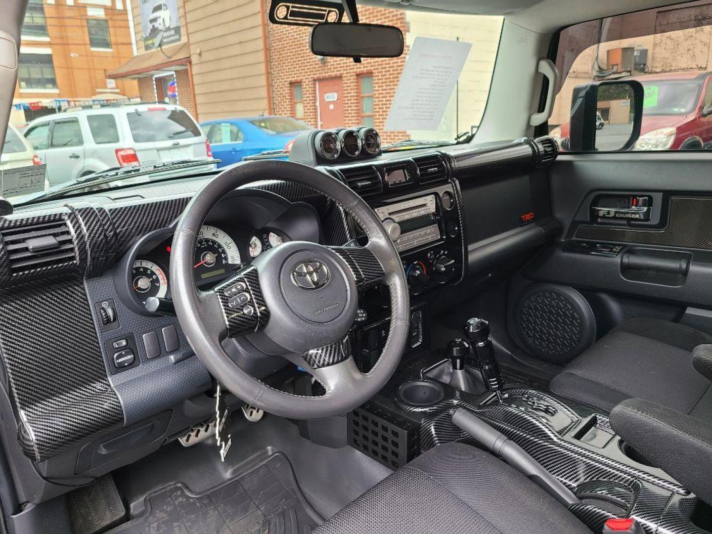 2007 BLACK TOYOTA FJ CRUISER UTILITY (JTEBU11F270) with an 4.0L engine, Automatic transmission, located at 117 North Cameron Street, Harrisburg, PA, 17101, (717) 963-8962, 40.266762, -76.875259 - CASH DEAL $22,995 - Photo#14