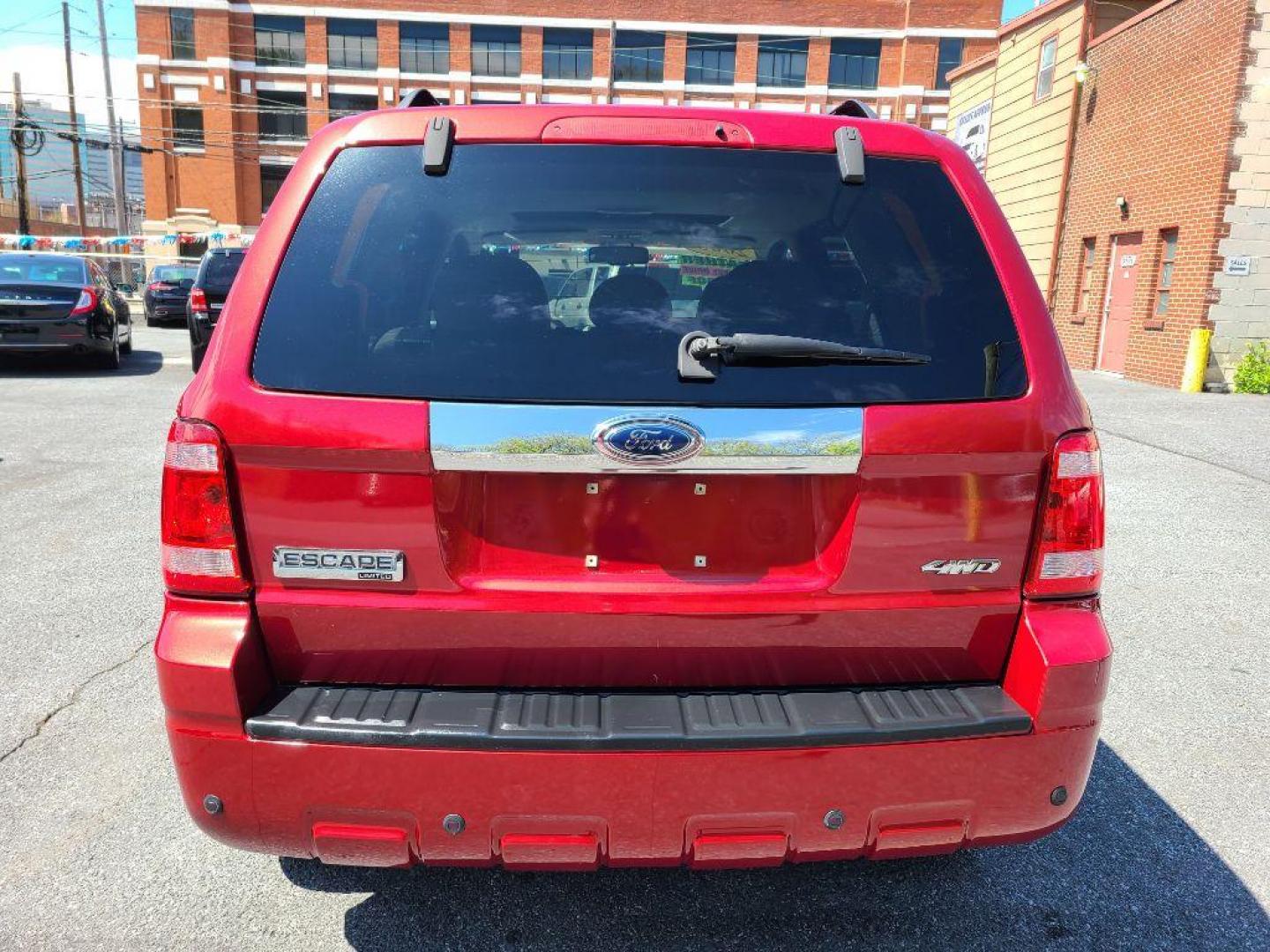 2008 RED FORD ESCAPE LIMITED (1FMCU94198K) with an 3.0L engine, Automatic transmission, located at 117 North Cameron Street, Harrisburg, PA, 17101, (717) 963-8962, 40.266762, -76.875259 - WE FINANCE!!! Good Credit/ Bad Credit/ No Credit - ALL Trade-Ins Welcomed!!! ***Guaranteed Credit Approval*** APPLY ONLINE or CALL us TODAY ;) Internet Prices and Marketplace Prices are SPECIAL discounted ***CASH DEALS*** Retail Prices are higher. Please call us to discuss your cash and finan - Photo#3