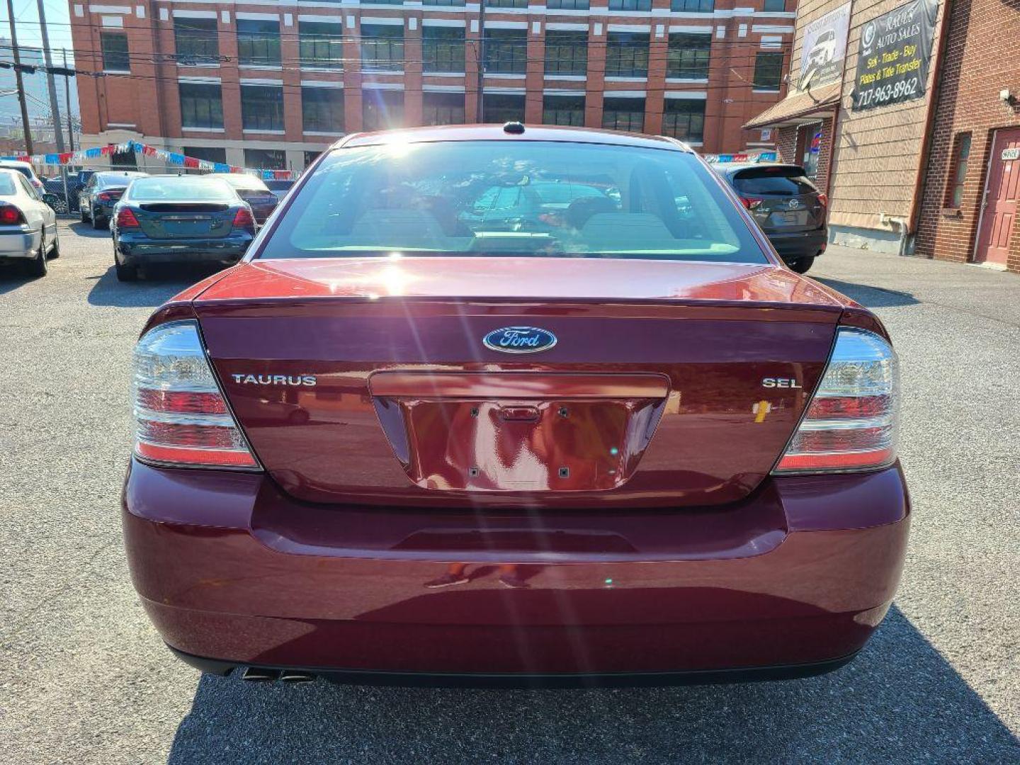 2008 RED FORD TAURUS SEL (1FAHP24W88G) with an 3.5L engine, Automatic transmission, located at 117 North Cameron Street, Harrisburg, PA, 17101, (717) 963-8962, 40.266762, -76.875259 - WE FINANCE!!! Good Credit/ Bad Credit/ No Credit - ALL Trade-Ins Welcomed!!! ***Guaranteed Credit Approval*** APPLY ONLINE or CALL us TODAY ;) Internet Prices and Marketplace Prices are SPECIAL discounted ***CASH DEALS*** Retail Prices are higher. Please call us to discuss your cash and finan - Photo#3