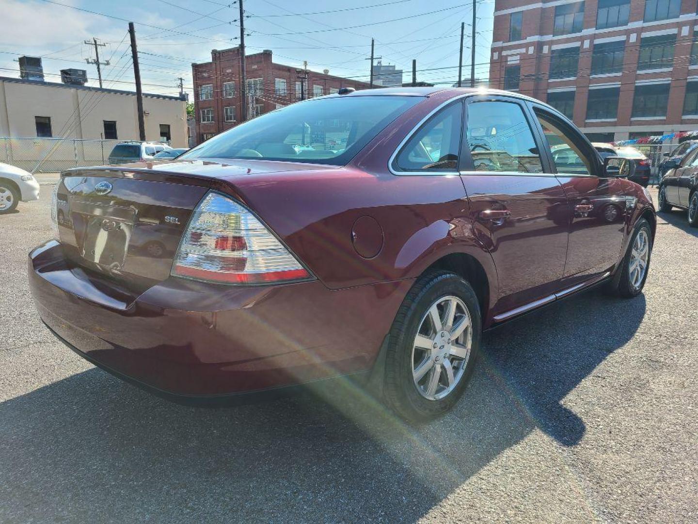 2008 RED FORD TAURUS SEL (1FAHP24W88G) with an 3.5L engine, Automatic transmission, located at 117 North Cameron Street, Harrisburg, PA, 17101, (717) 963-8962, 40.266762, -76.875259 - WE FINANCE!!! Good Credit/ Bad Credit/ No Credit - ALL Trade-Ins Welcomed!!! ***Guaranteed Credit Approval*** APPLY ONLINE or CALL us TODAY ;) Internet Prices and Marketplace Prices are SPECIAL discounted ***CASH DEALS*** Retail Prices are higher. Please call us to discuss your cash and finan - Photo#4