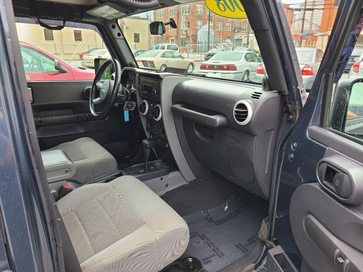 2008 BLUE JEEP WRANGLER UNLIMI SAHARA (1J4GA59118L) with an 3.8L engine, Automatic transmission, located at 117 North Cameron Street, Harrisburg, PA, 17101, (717) 963-8962, 40.266762, -76.875259 - WE FINANCE!!! Good Credit/ Bad Credit/ No Credit - ALL Trade-Ins Welcomed!!! ***Guaranteed Credit Approval*** APPLY ONLINE or CALL us TODAY ;) Internet Prices and Marketplace Prices are SPECIAL discounted ***CASH DEALS*** Retail Prices are higher. Please call us to discuss your cash and finan - Photo#16