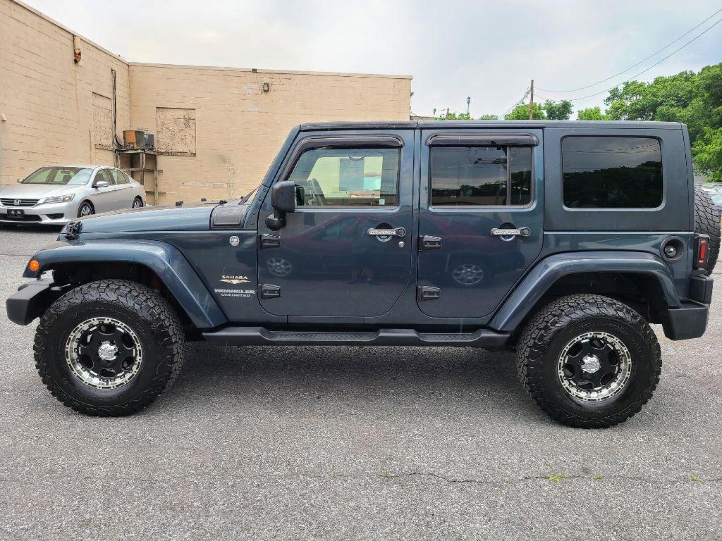 2008 BLUE JEEP WRANGLER UNLIMI SAHARA (1J4GA59118L) with an 3.8L engine, Automatic transmission, located at 117 North Cameron Street, Harrisburg, PA, 17101, (717) 963-8962, 40.266762, -76.875259 - WE FINANCE!!! Good Credit/ Bad Credit/ No Credit - ALL Trade-Ins Welcomed!!! ***Guaranteed Credit Approval*** APPLY ONLINE or CALL us TODAY ;) Internet Prices and Marketplace Prices are SPECIAL discounted ***CASH DEALS*** Retail Prices are higher. Please call us to discuss your cash and finan - Photo#1