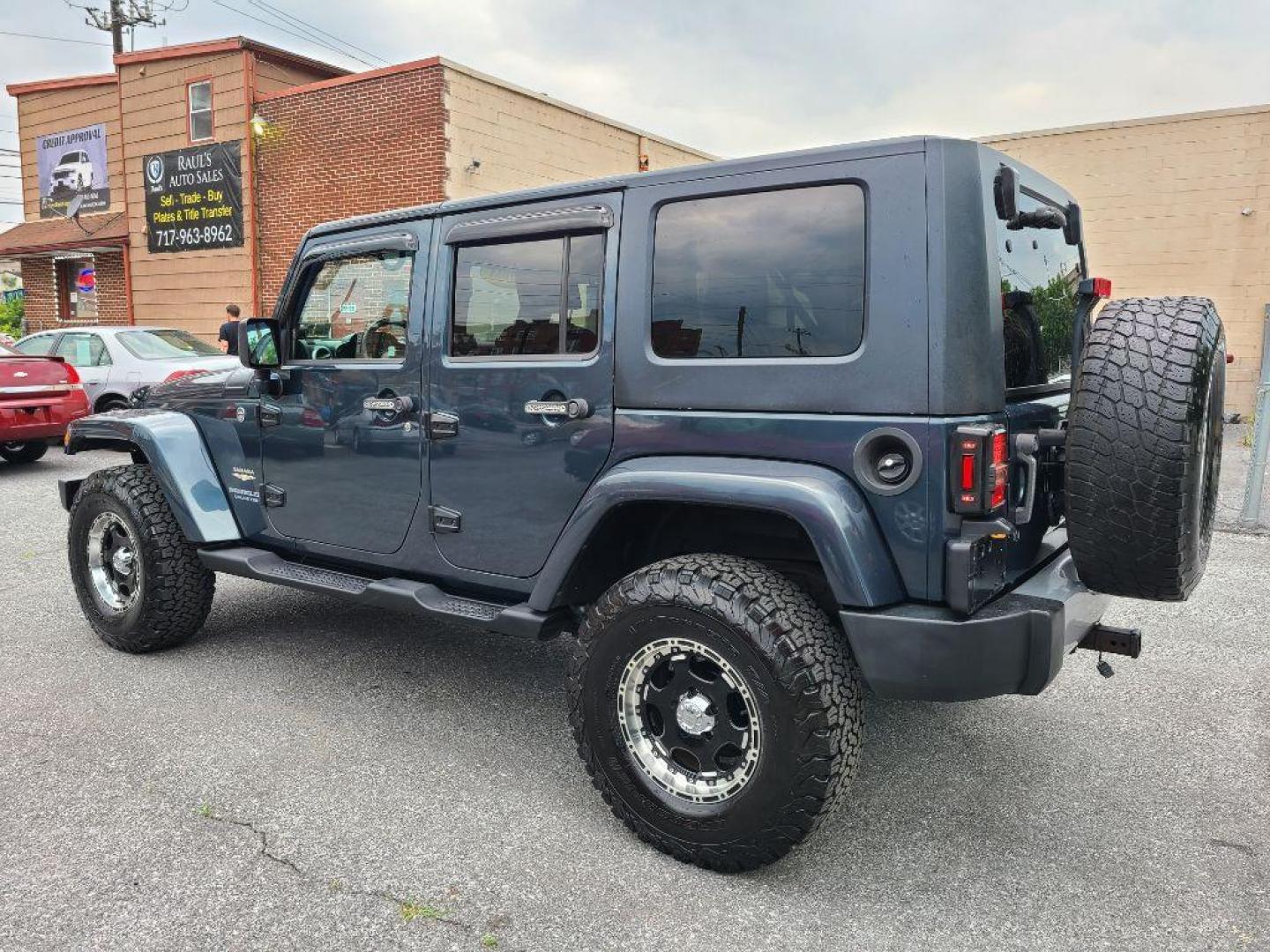 2008 BLUE JEEP WRANGLER UNLIMI SAHARA (1J4GA59118L) with an 3.8L engine, Automatic transmission, located at 117 North Cameron Street, Harrisburg, PA, 17101, (717) 963-8962, 40.266762, -76.875259 - WE FINANCE!!! Good Credit/ Bad Credit/ No Credit - ALL Trade-Ins Welcomed!!! ***Guaranteed Credit Approval*** APPLY ONLINE or CALL us TODAY ;) Internet Prices and Marketplace Prices are SPECIAL discounted ***CASH DEALS*** Retail Prices are higher. Please call us to discuss your cash and finan - Photo#2