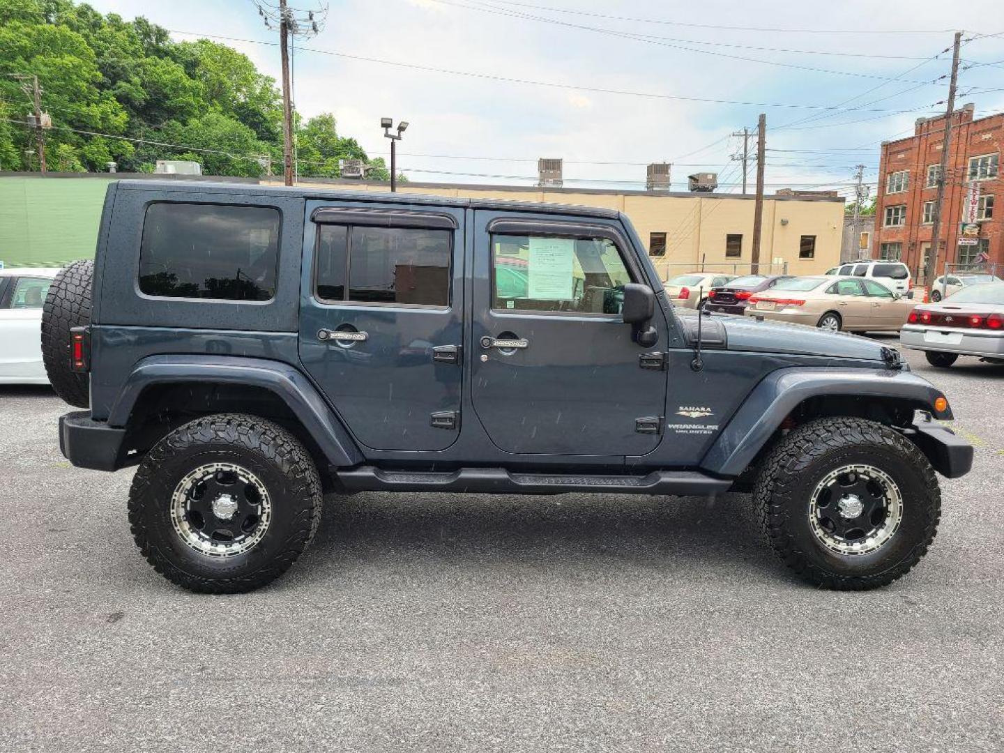 2008 BLUE JEEP WRANGLER UNLIMI SAHARA (1J4GA59118L) with an 3.8L engine, Automatic transmission, located at 117 North Cameron Street, Harrisburg, PA, 17101, (717) 963-8962, 40.266762, -76.875259 - WE FINANCE!!! Good Credit/ Bad Credit/ No Credit - ALL Trade-Ins Welcomed!!! ***Guaranteed Credit Approval*** APPLY ONLINE or CALL us TODAY ;) Internet Prices and Marketplace Prices are SPECIAL discounted ***CASH DEALS*** Retail Prices are higher. Please call us to discuss your cash and finan - Photo#5