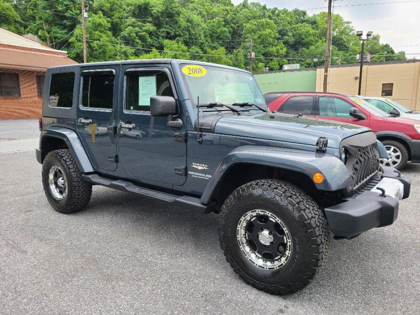 2008 BLUE JEEP WRANGLER UNLIMI SAHARA (1J4GA59118L) with an 3.8L engine, Automatic transmission, located at 117 North Cameron Street, Harrisburg, PA, 17101, (717) 963-8962, 40.266762, -76.875259 - WE FINANCE!!! Good Credit/ Bad Credit/ No Credit - ALL Trade-Ins Welcomed!!! ***Guaranteed Credit Approval*** APPLY ONLINE or CALL us TODAY ;) Internet Prices and Marketplace Prices are SPECIAL discounted ***CASH DEALS*** Retail Prices are higher. Please call us to discuss your cash and finan - Photo#6