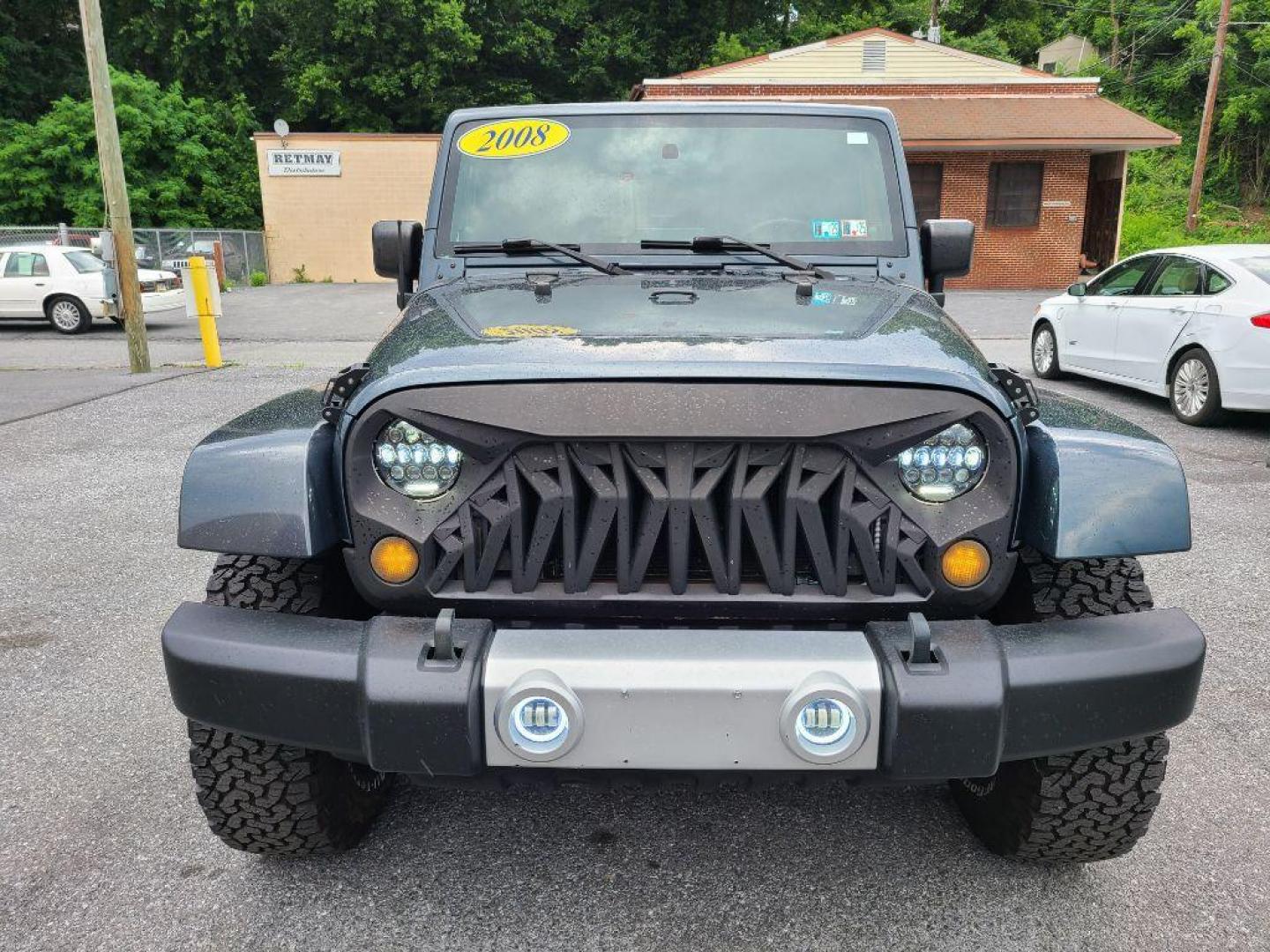 2008 BLUE JEEP WRANGLER UNLIMI SAHARA (1J4GA59118L) with an 3.8L engine, Automatic transmission, located at 117 North Cameron Street, Harrisburg, PA, 17101, (717) 963-8962, 40.266762, -76.875259 - WE FINANCE!!! Good Credit/ Bad Credit/ No Credit - ALL Trade-Ins Welcomed!!! ***Guaranteed Credit Approval*** APPLY ONLINE or CALL us TODAY ;) Internet Prices and Marketplace Prices are SPECIAL discounted ***CASH DEALS*** Retail Prices are higher. Please call us to discuss your cash and finan - Photo#7