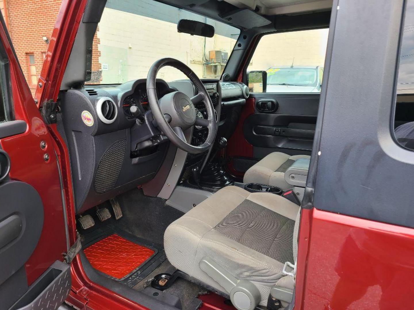 2009 BURGUN JEEP WRANGLER X (1J4FA24179L) with an 3.8L engine, 4-Speed Manual transmission, located at 117 North Cameron Street, Harrisburg, PA, 17101, (717) 963-8962, 40.266762, -76.875259 - WE FINANCE!!! Good Credit/ Bad Credit/ No Credit - ALL Trade-Ins Welcomed!!! ***Guaranteed Credit Approval*** APPLY ONLINE or CALL us TODAY ;) Internet Prices and Marketplace Prices are SPECIAL discounted ***CASH DEALS*** Retail Prices are higher. Please call us to discuss your cash and finan - Photo#14