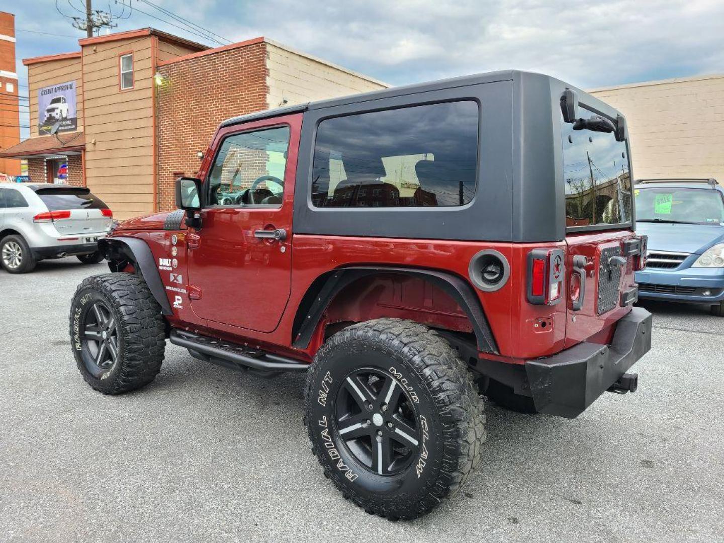 2009 BURGUN JEEP WRANGLER X (1J4FA24179L) with an 3.8L engine, 4-Speed Manual transmission, located at 117 North Cameron Street, Harrisburg, PA, 17101, (717) 963-8962, 40.266762, -76.875259 - WE FINANCE!!! Good Credit/ Bad Credit/ No Credit - ALL Trade-Ins Welcomed!!! ***Guaranteed Credit Approval*** APPLY ONLINE or CALL us TODAY ;) Internet Prices and Marketplace Prices are SPECIAL discounted ***CASH DEALS*** Retail Prices are higher. Please call us to discuss your cash and finan - Photo#2