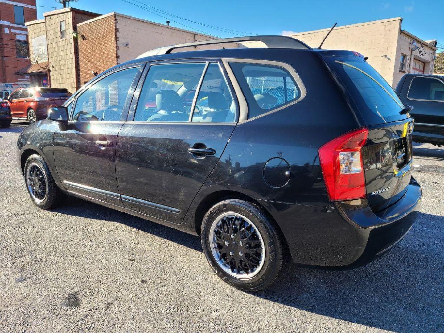 2009 BLACK KIA RONDO BASE (KNAFG528097) with an 2.4L engine, Automatic transmission, located at 7981 Paxton Street, Harrisburg, PA, 17111, (717) 561-2926, 40.261490, -76.749229 - WE FINANCE!!! Good Credit/ Bad Credit/ No Credit - ALL Trade-Ins Welcomed!!! ***Guaranteed Credit Approval*** APPLY ONLINE or CALL us TODAY ;) Internet Prices and Marketplace Prices are SPECIAL discounted ***CASH DEALS*** Retail Prices are higher. Please call us to discuss your cash and finan - Photo#2