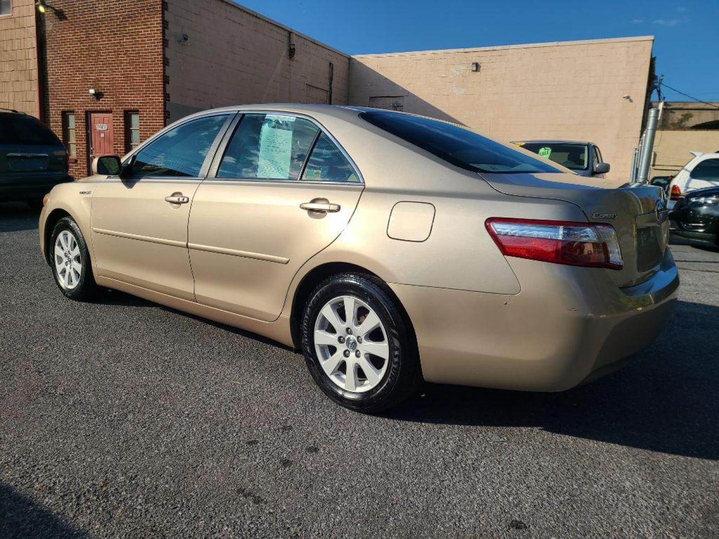 2009 GOLD TOYOTA CAMRY HYBRID (4T1BB46K89U) with an 2.4L engine, Continuously Variable transmission, located at 7981 Paxton Street, Harrisburg, PA, 17111, (717) 561-2926, 40.261490, -76.749229 - WE FINANCE!!! Good Credit/ Bad Credit/ No Credit - ALL Trade-Ins Welcomed!!! ***Guaranteed Credit Approval*** APPLY ONLINE or CALL us TODAY ;) Internet Prices and Marketplace Prices are SPECIAL discounted ***CASH DEALS*** Retail Prices are higher. Please call us to discuss your cash and finan - Photo#2