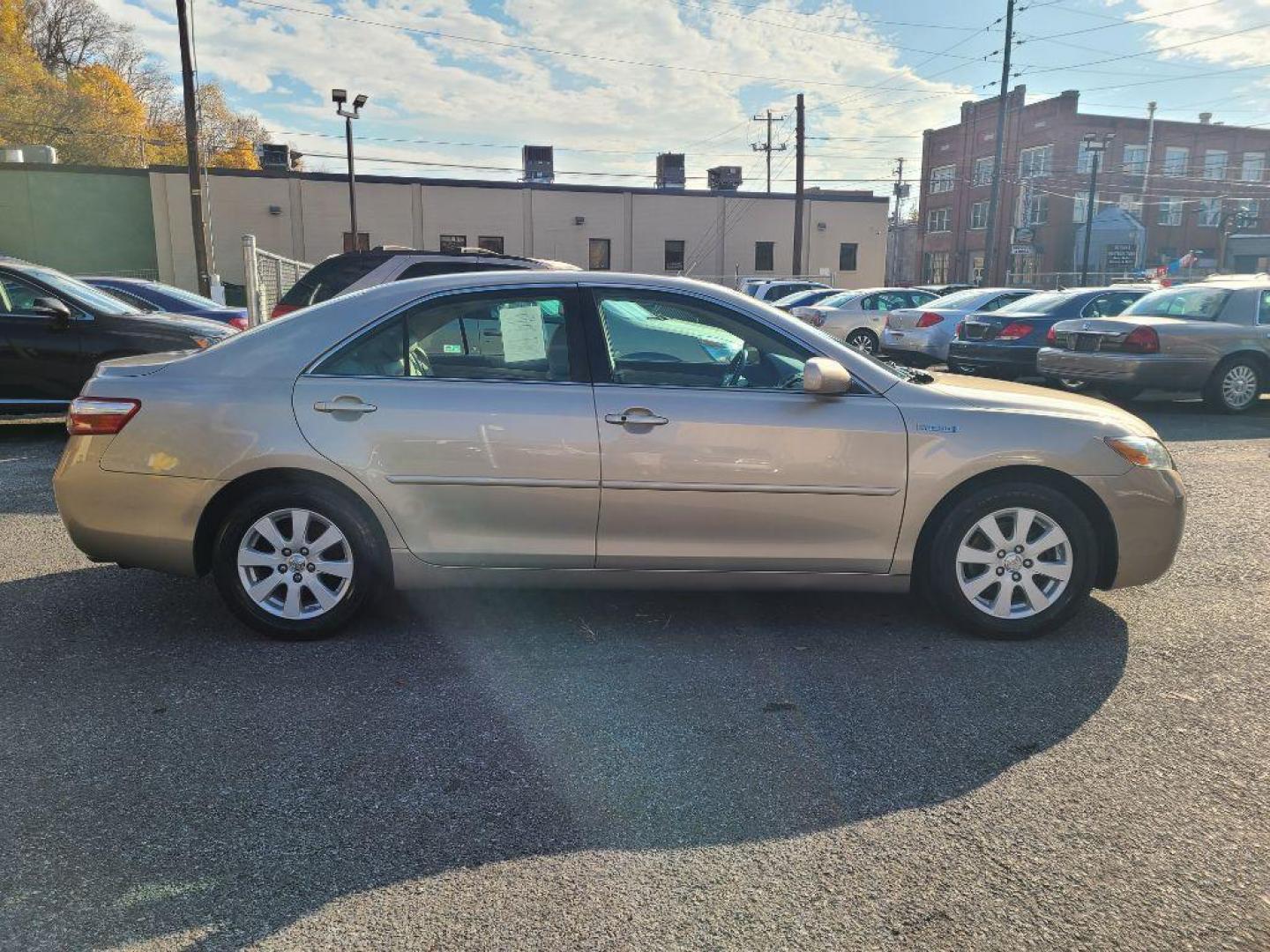 2009 GOLD TOYOTA CAMRY HYBRID (4T1BB46K89U) with an 2.4L engine, Continuously Variable transmission, located at 7981 Paxton Street, Harrisburg, PA, 17111, (717) 561-2926, 40.261490, -76.749229 - WE FINANCE!!! Good Credit/ Bad Credit/ No Credit - ALL Trade-Ins Welcomed!!! ***Guaranteed Credit Approval*** APPLY ONLINE or CALL us TODAY ;) Internet Prices and Marketplace Prices are SPECIAL discounted ***CASH DEALS*** Retail Prices are higher. Please call us to discuss your cash and finan - Photo#5