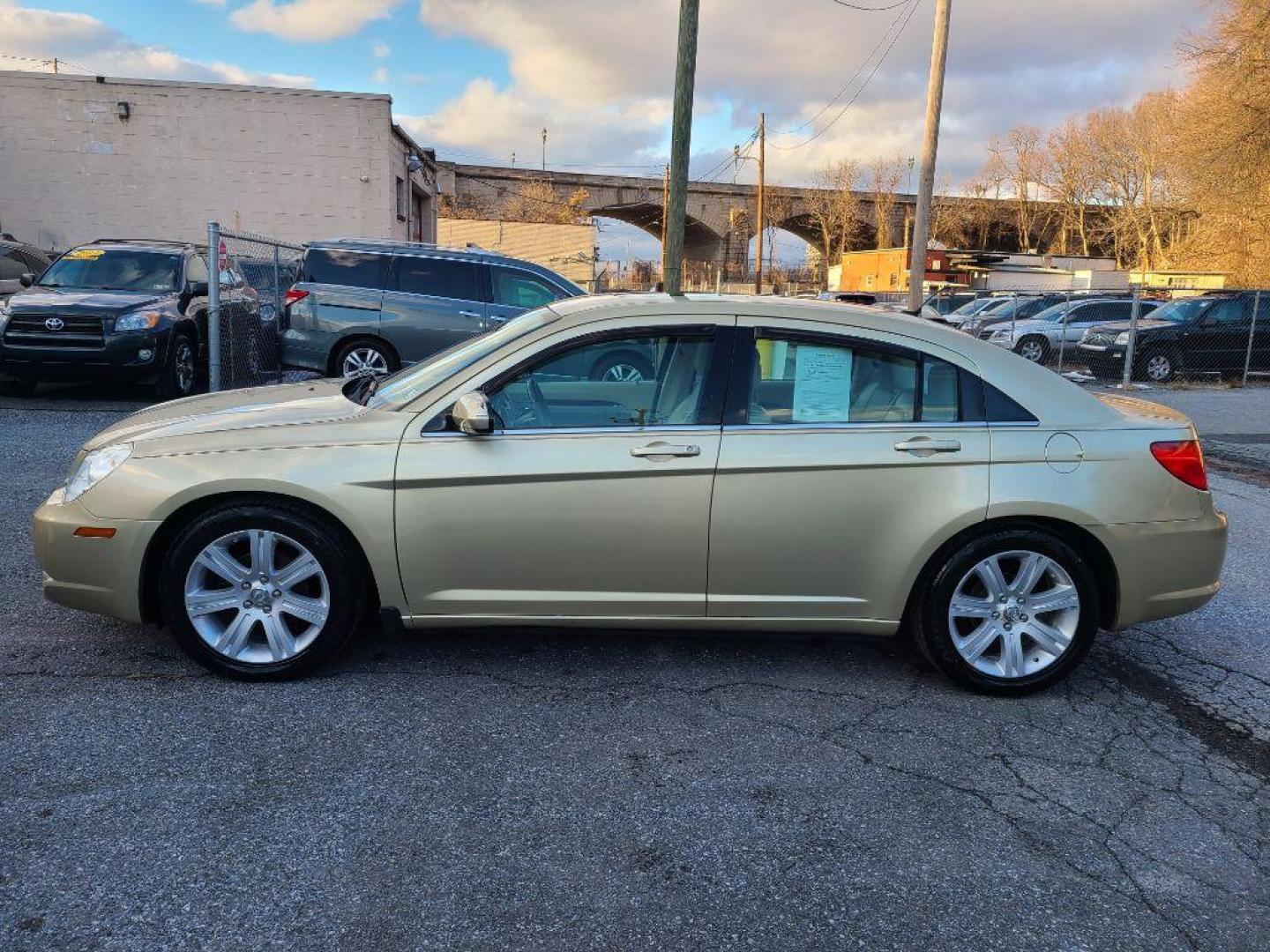 2010 GOLD CHRYSLER SEBRING LIMITED (1C3CC5FVXAN) with an 3.5L engine, Automatic transmission, located at 117 North Cameron Street, Harrisburg, PA, 17101, (717) 963-8962, 40.266762, -76.875259 - WE FINANCE!!! Good Credit/ Bad Credit/ No Credit - ALL Trade-Ins Welcomed!!! ***Guaranteed Credit Approval*** APPLY ONLINE or CALL us TODAY ;) Internet Prices and Marketplace Prices are SPECIAL discounted ***CASH DEALS*** Retail Prices are higher. Please call us to discuss your cash and finan - Photo#1