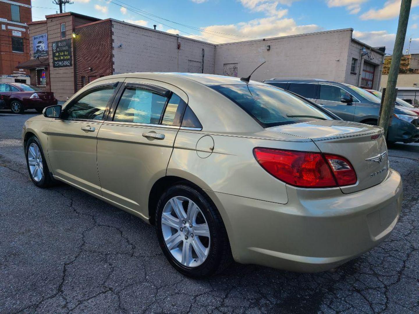 2010 GOLD CHRYSLER SEBRING LIMITED (1C3CC5FVXAN) with an 3.5L engine, Automatic transmission, located at 117 North Cameron Street, Harrisburg, PA, 17101, (717) 963-8962, 40.266762, -76.875259 - WE FINANCE!!! Good Credit/ Bad Credit/ No Credit - ALL Trade-Ins Welcomed!!! ***Guaranteed Credit Approval*** APPLY ONLINE or CALL us TODAY ;) Internet Prices and Marketplace Prices are SPECIAL discounted ***CASH DEALS*** Retail Prices are higher. Please call us to discuss your cash and finan - Photo#2