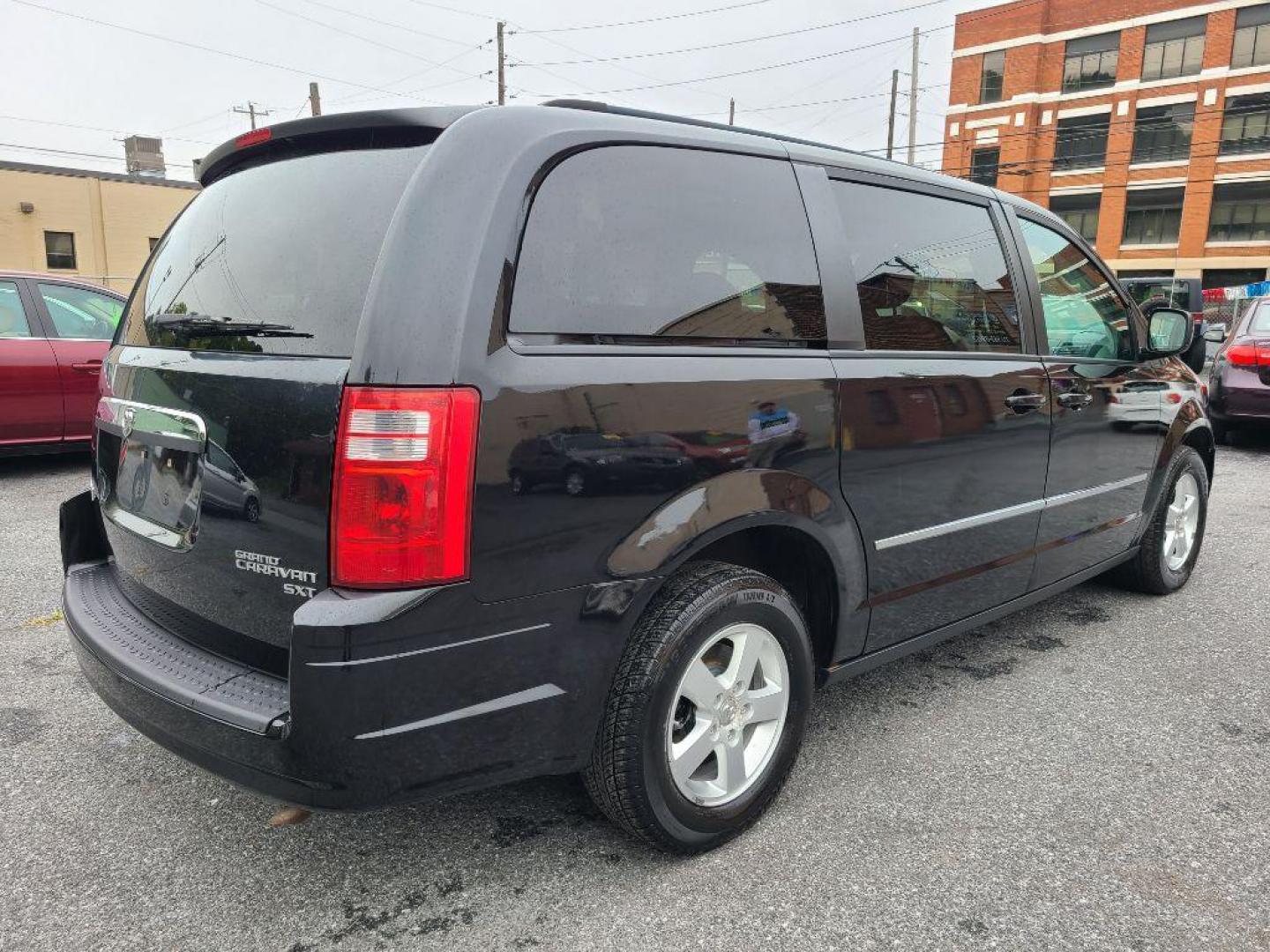 2010 BLACK DODGE GRAND CARAVAN SXT (2D4RN5DX6AR) with an 4.0L engine, Automatic transmission, located at 117 North Cameron Street, Harrisburg, PA, 17101, (717) 963-8962, 40.266762, -76.875259 - WE FINANCE!!! Good Credit/ Bad Credit/ No Credit - ALL Trade-Ins Welcomed!!! ***Guaranteed Credit Approval*** APPLY ONLINE or CALL us TODAY ;) Internet Prices and Marketplace Prices are SPECIAL discounted ***CASH DEALS*** Retail Prices are higher. Please call us to discuss your cash and finan - Photo#4