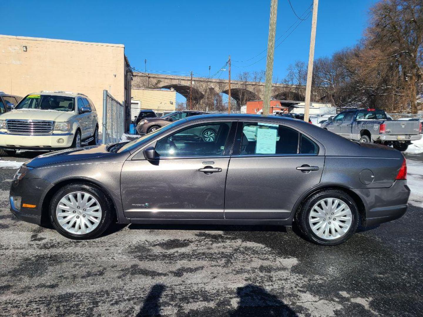 2010 GREY FORD FUSION HYBRID (3FADP0L38AR) with an 2.5L engine, Continuously Variable transmission, located at 117 North Cameron Street, Harrisburg, PA, 17101, (717) 963-8962, 40.266762, -76.875259 - WE FINANCE!!! Good Credit/ Bad Credit/ No Credit - ALL Trade-Ins Welcomed!!! ***Guaranteed Credit Approval*** APPLY ONLINE or CALL us TODAY ;) Internet Prices and Marketplace Prices are SPECIAL discounted ***CASH DEALS*** Retail Prices are higher. Please call us to discuss your cash and finan - Photo#1